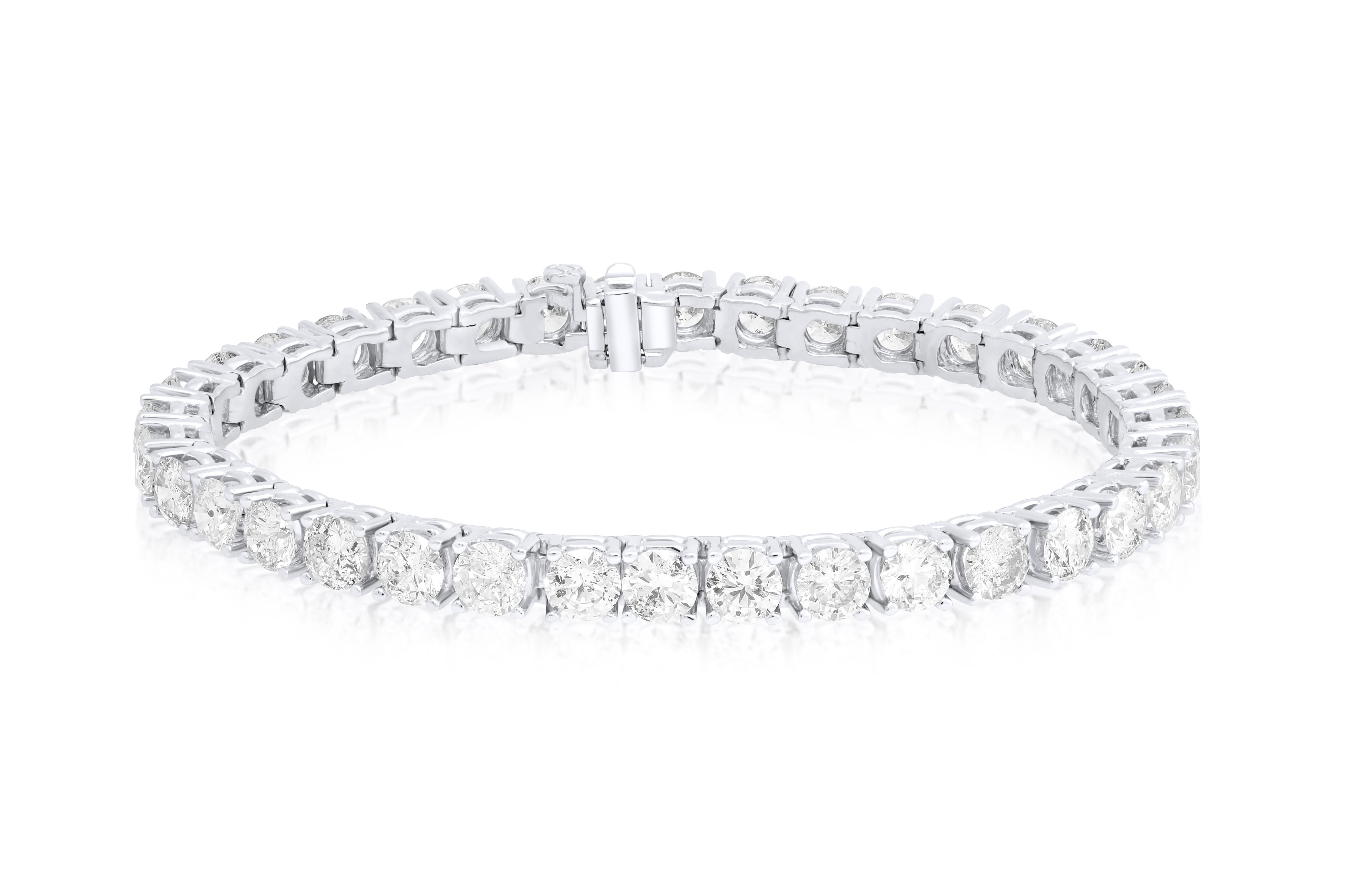 Platinum custom 4-prong diamond tennis bracelet 16.90 cts brilliant-cut round diamonds 0.50 carat each FG color SI clarity.  Excellent Cut.