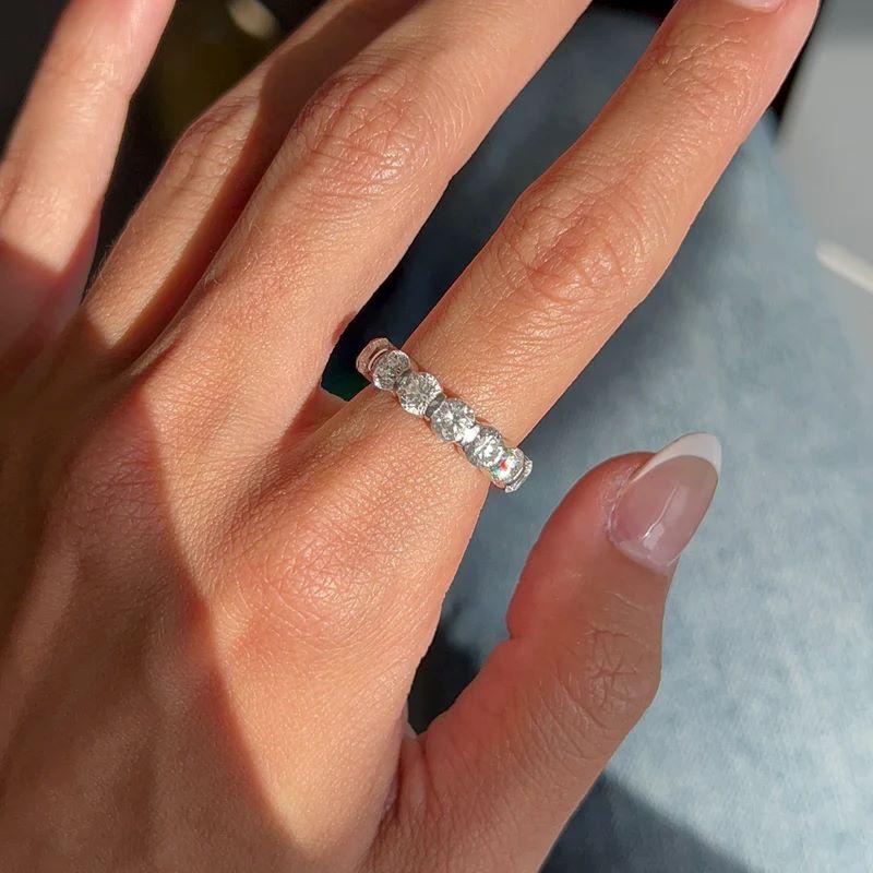 Diana M. Platinum 5.25 CT Round Diamond Band in Bar Setting In New Condition For Sale In New York, NY
