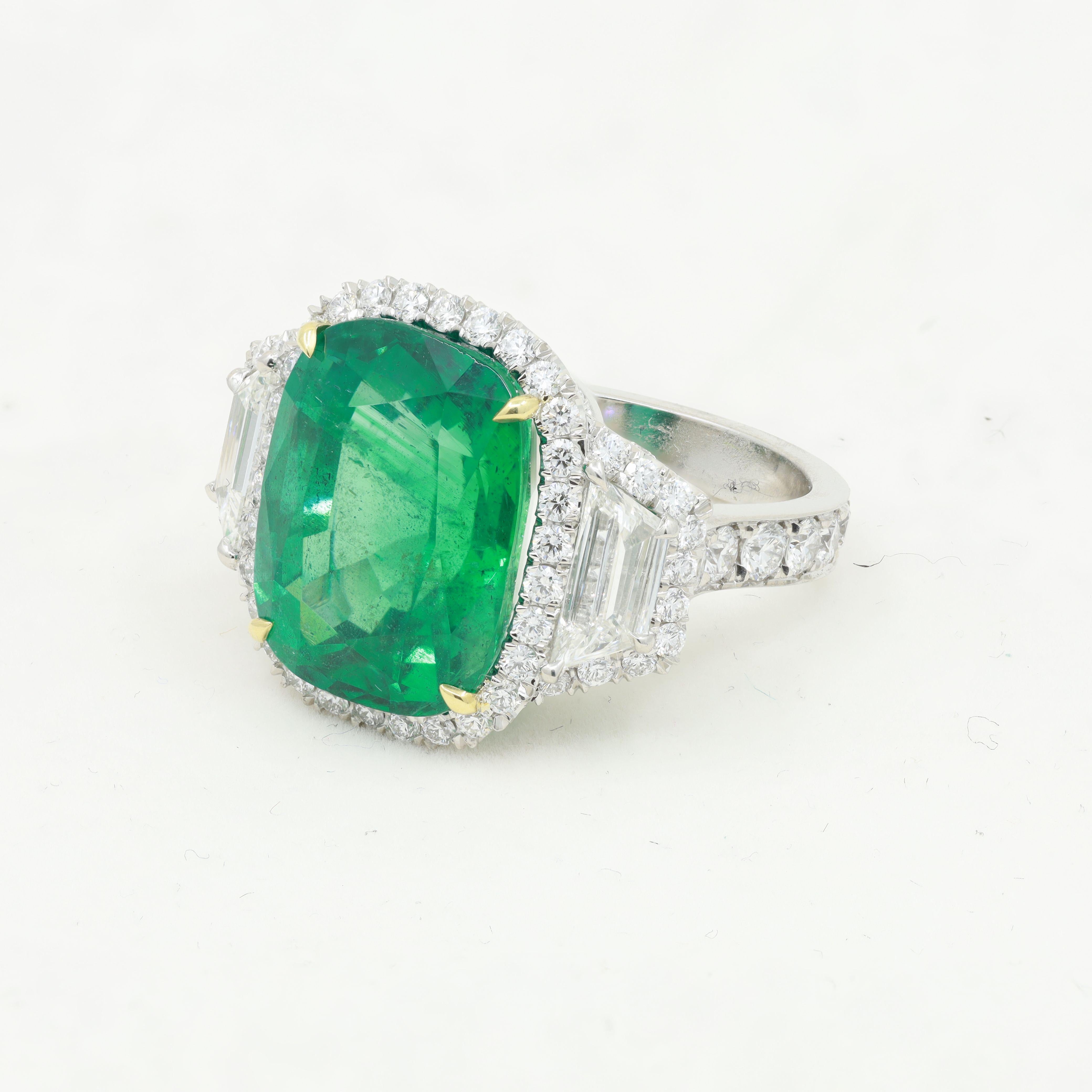 Modern Diana M. Platinum and 18 kt yellow gold emerald and diamond ring featuring 11.22 For Sale