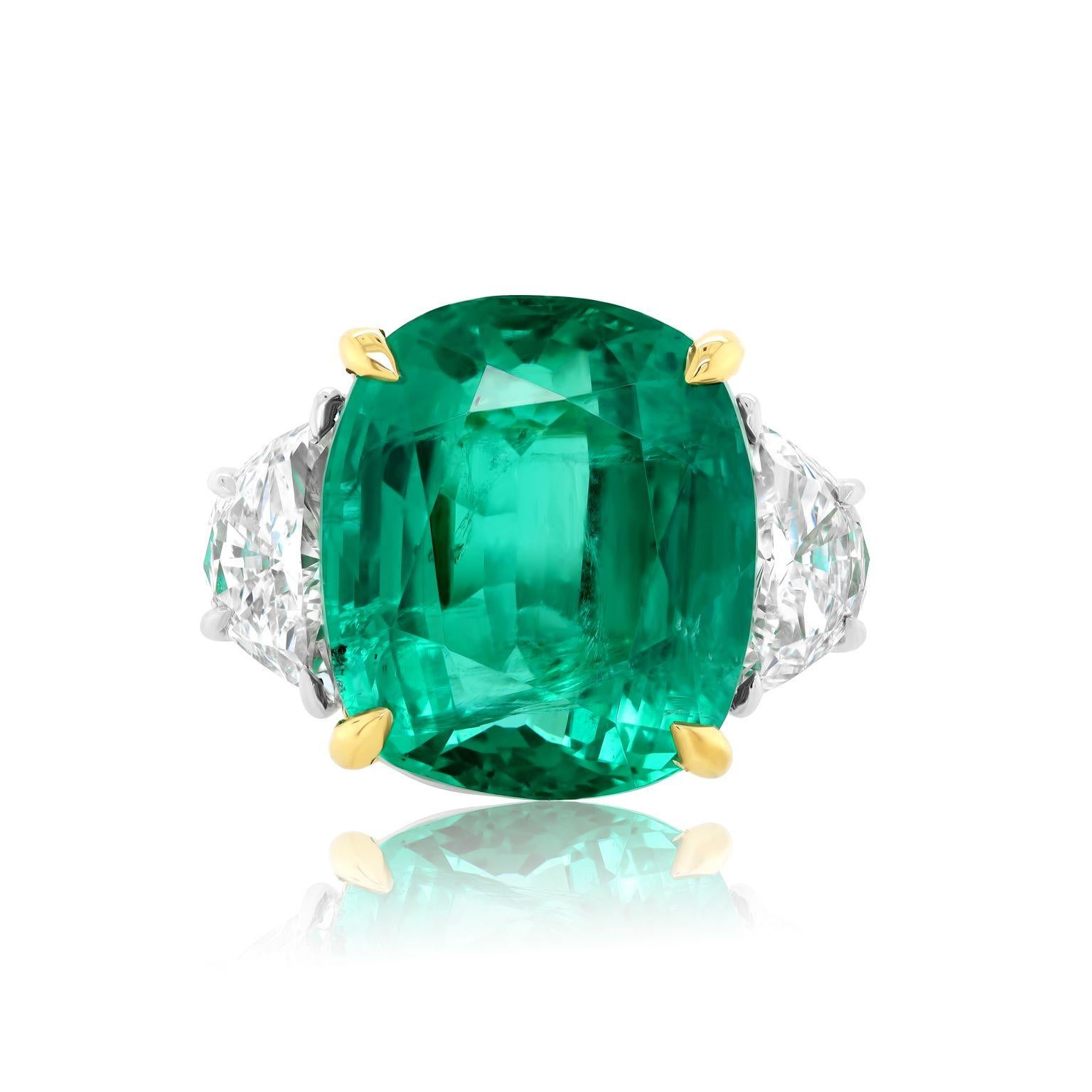 Platinum and 18 kt yellow gold emerald diamond ring featuring a 13.50 ct cushion cut emerald with 2 half moon diamonds on each side totaling 1.69 cts tw (certified).
Diana M. is a leading supplier of top-quality fine jewelry for over 35 years.
Diana