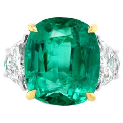Diana M. Platinum and 18 kt yellow gold emerald diamond ring featuring 13.50em 