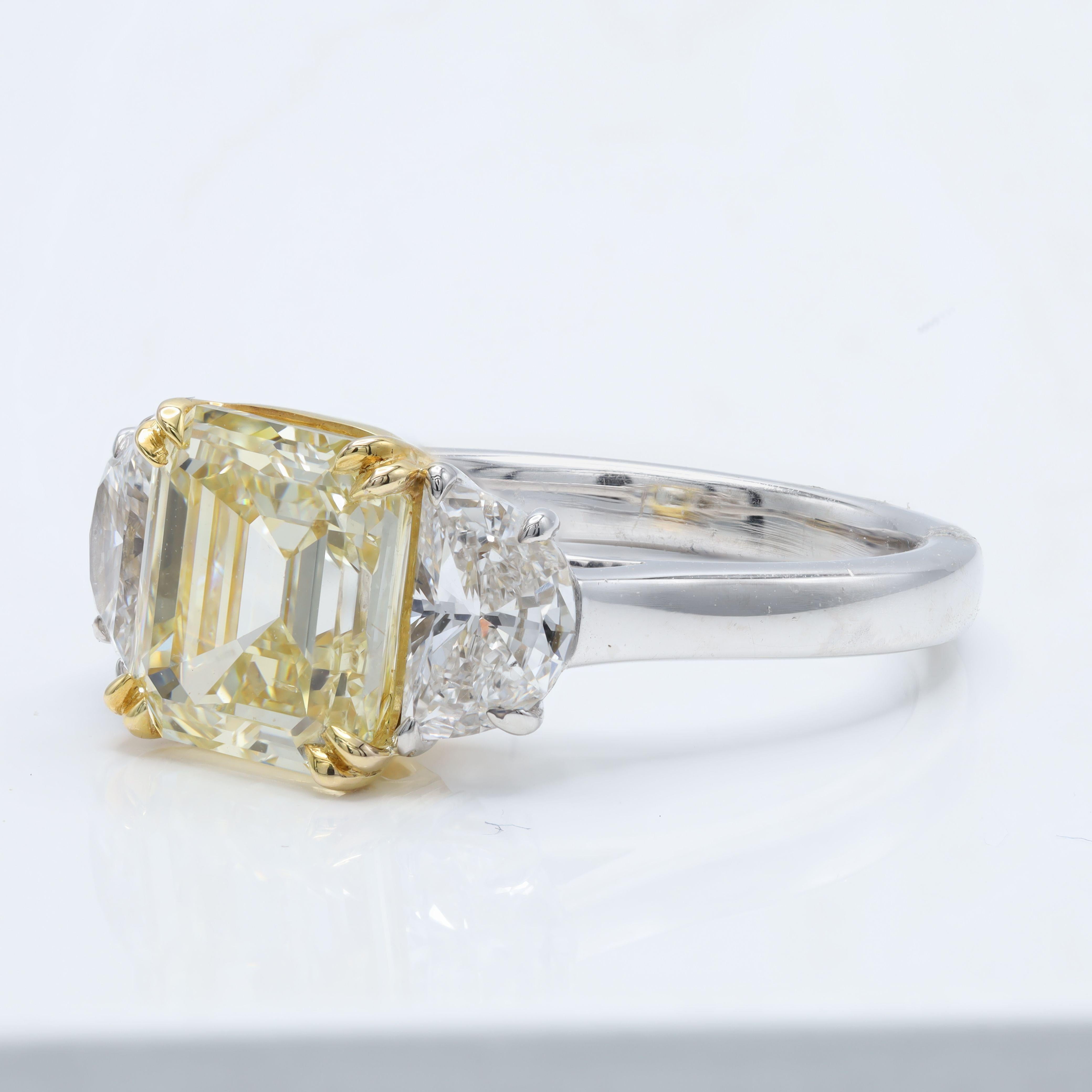 Platinum and 18 kt yellow gold engagement ring featuring a center 3.03 ct GIA certified (FY VS2) yellow diamond with 0.95 cts tw of half moon shaped white diamonds on the sides
Diana M. is a leading supplier of top-quality fine jewelry for over 35