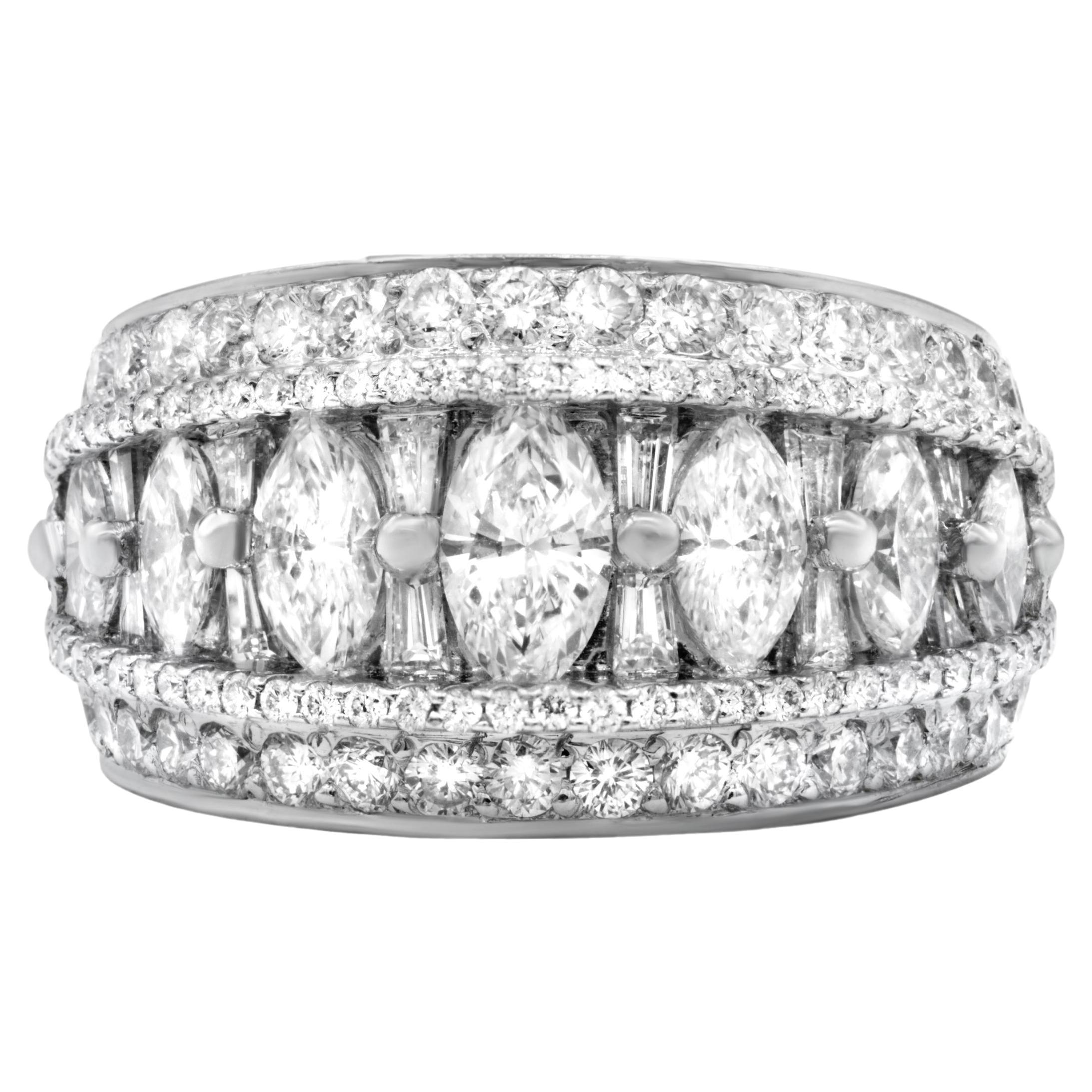 Diana M. Platinum diamond band adorned with rows of marquise, baguette 4.25cts For Sale