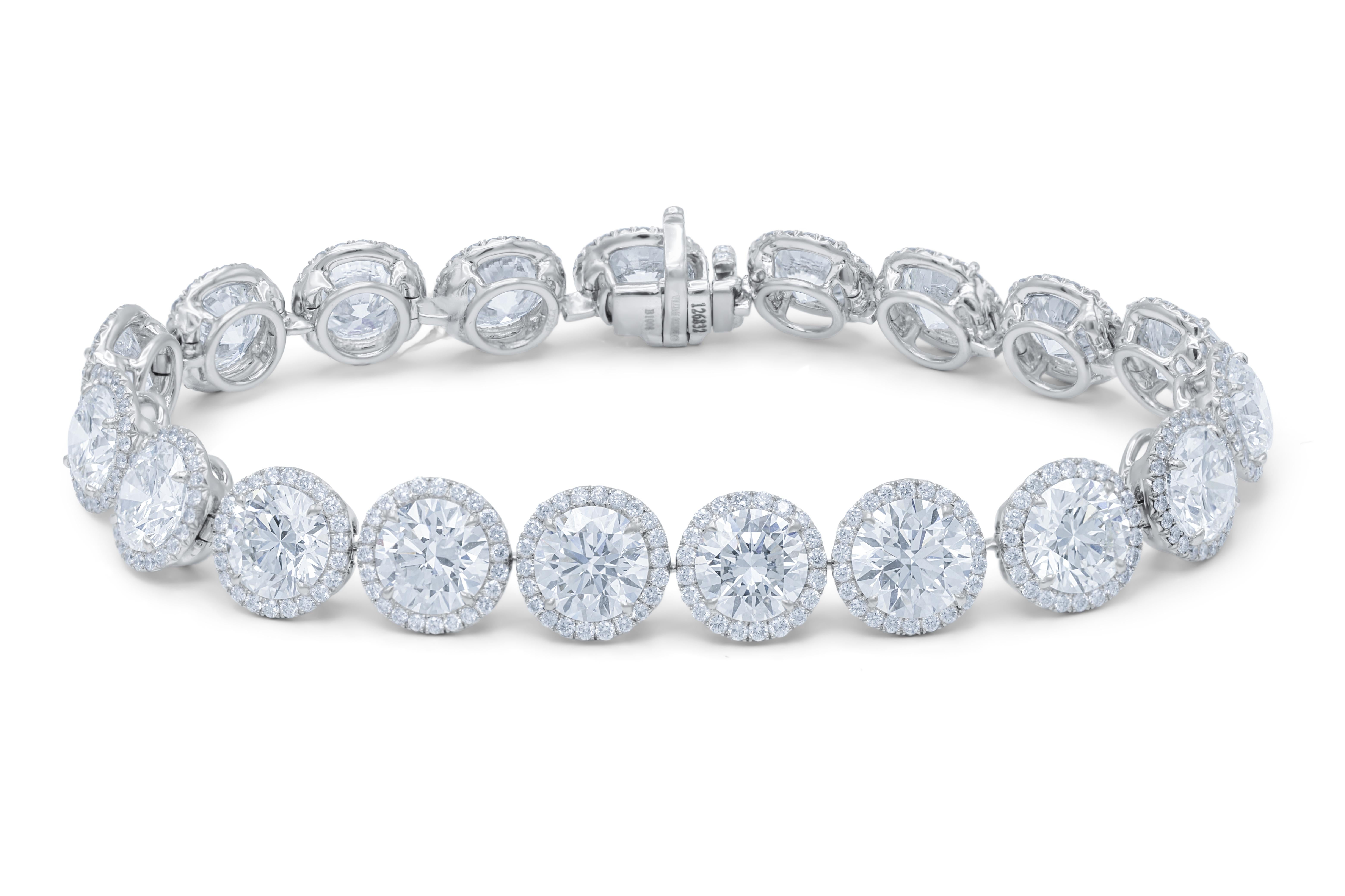 Platinum diamond bracelet featuring 19.76 cts of round diamonds surrounded by 2.16 cts round diamonds creating a halo design (GH) Color, VVS-VS-Clarity, GIA Certified)
Diana M. is a leading supplier of top-quality fine jewelry for over 35