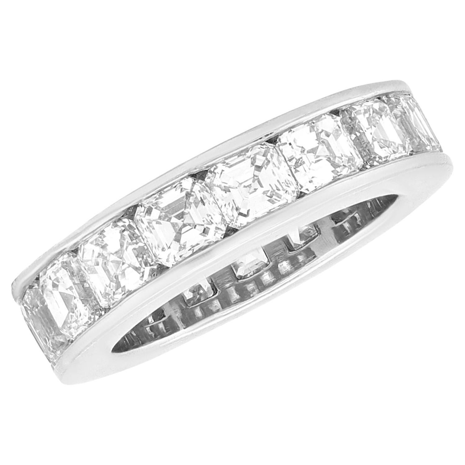 Diana M. platinum diamond channel set eternity band all the way around features 