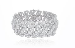 Diana M. Platinum diamond fashion bracelet featuring clusters of 52.00 cts pear