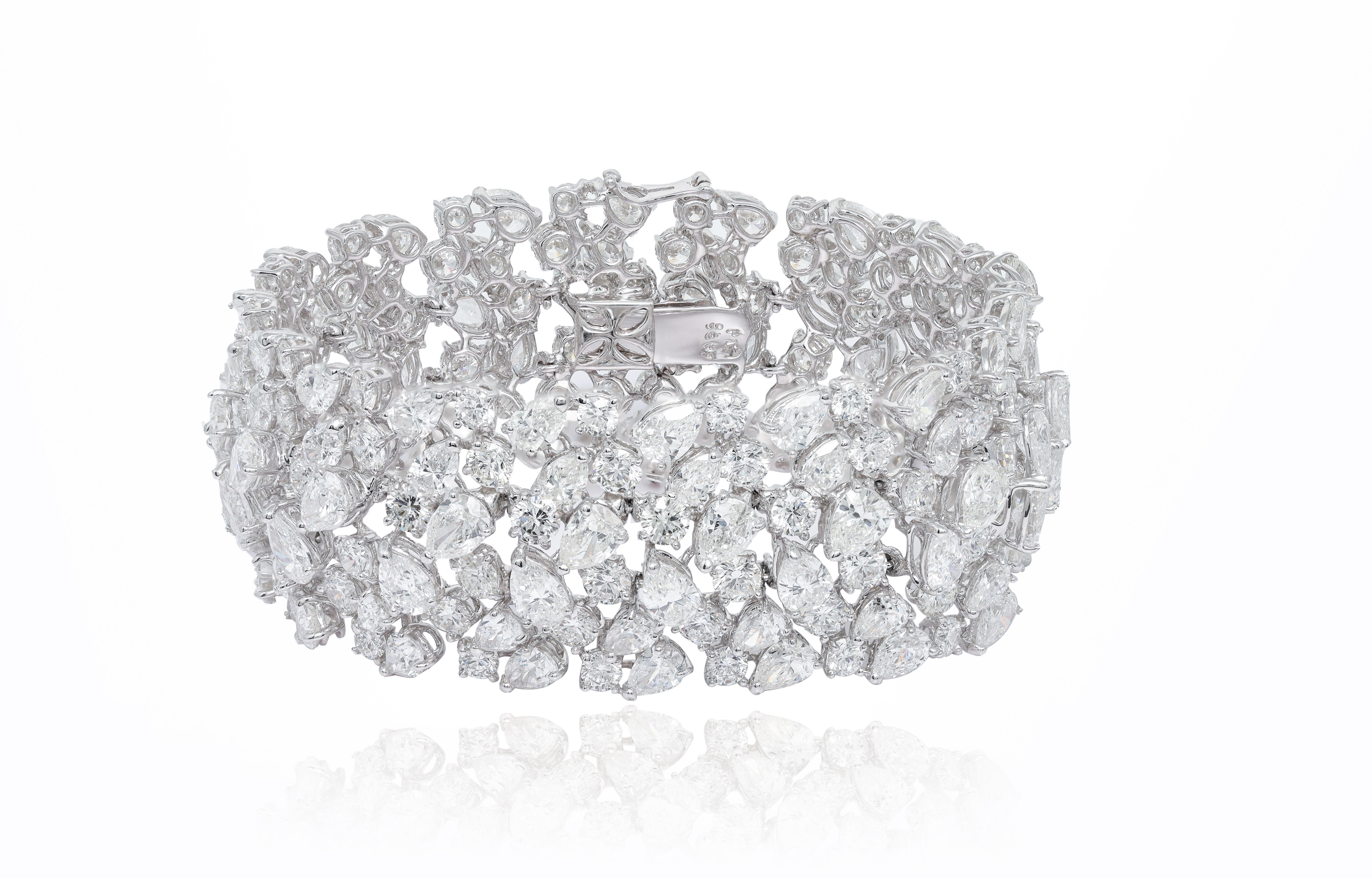 Pear Cut Diana M. Platinum diamond fashion bracelet featuring clusters of 52.00 cts pear  For Sale