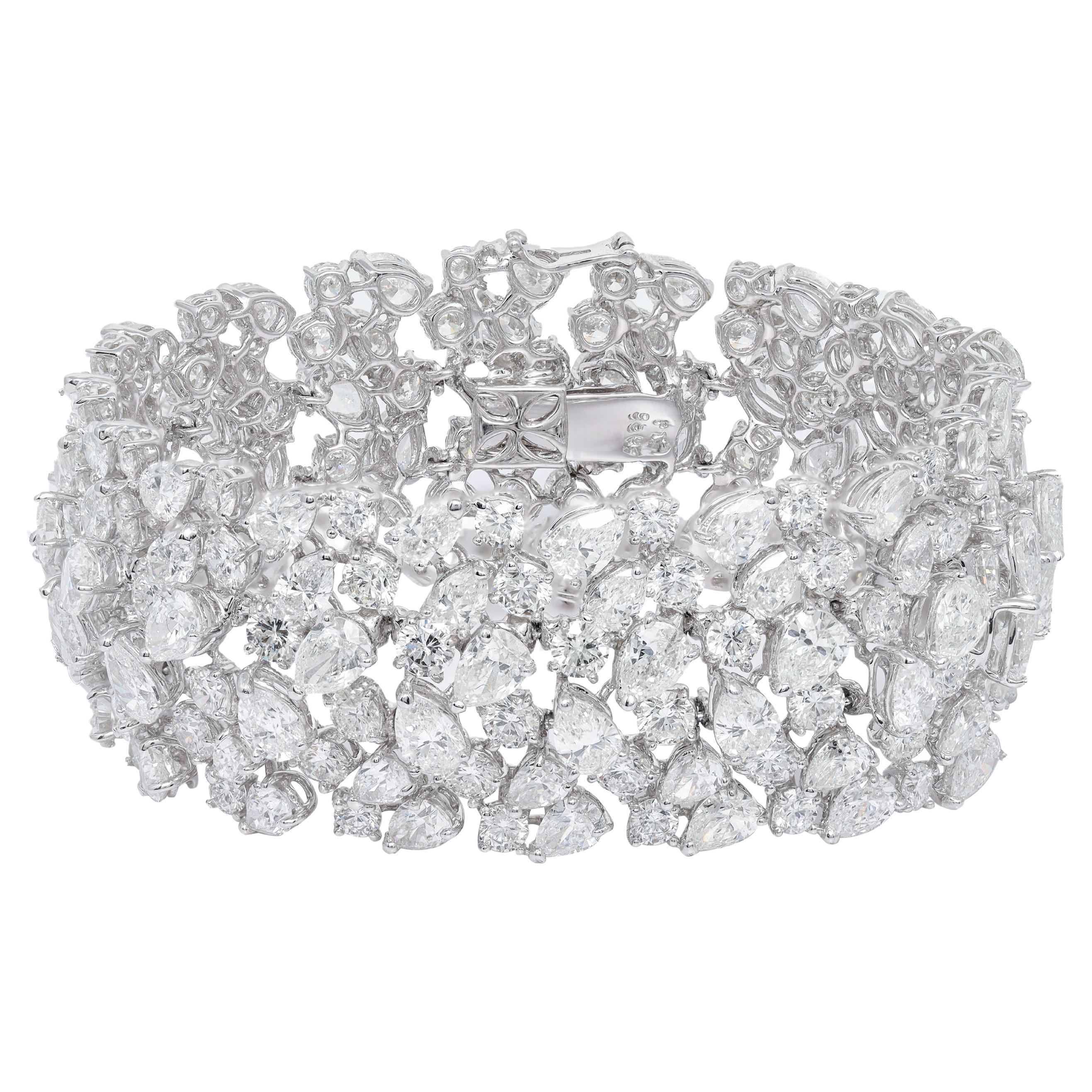 Diana M. Platinum diamond fashion bracelet featuring clusters of 52.00 cts pear  For Sale