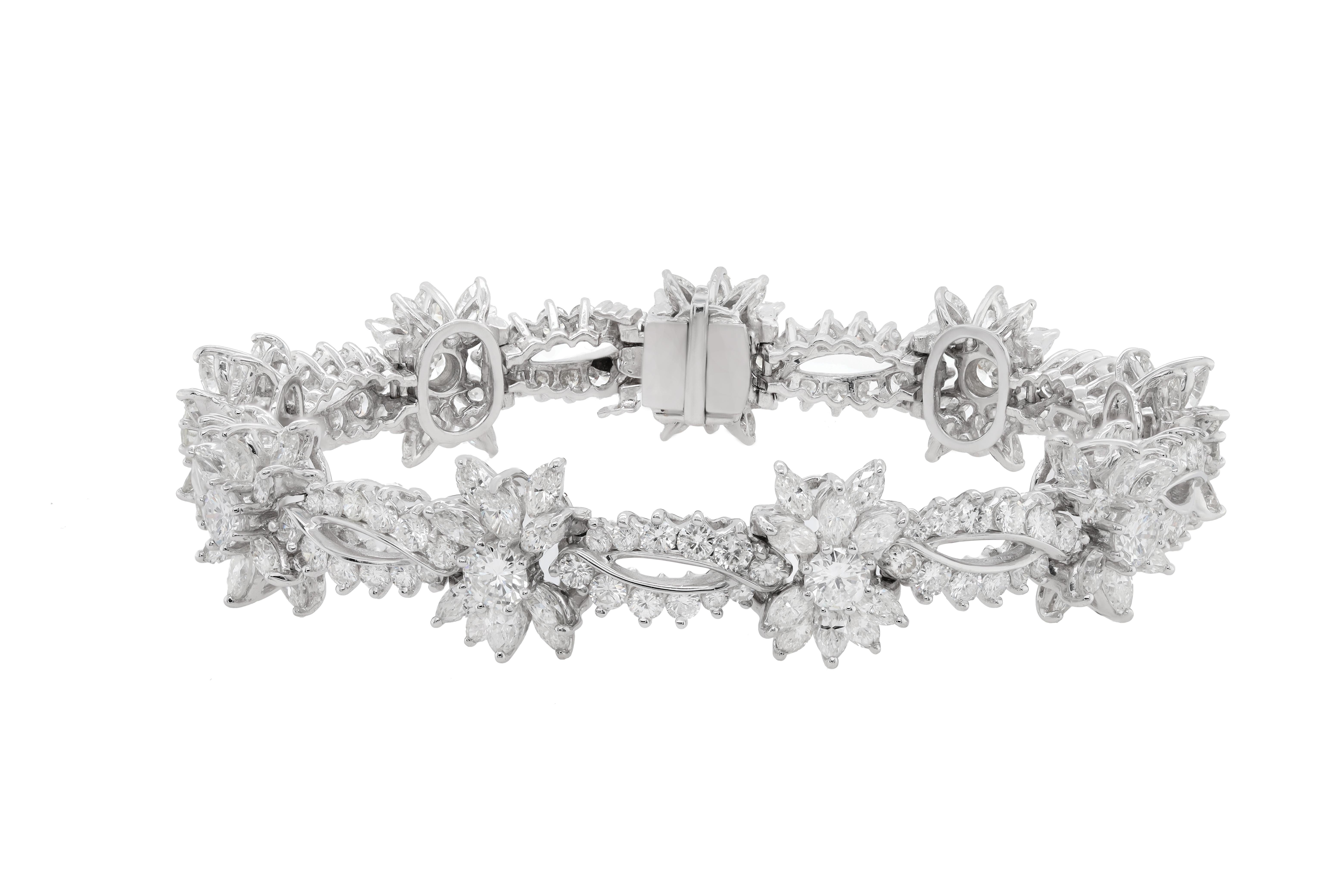 Mixed Cut Diana M. Platinum diamond fashion bracelet featuring snow flake cluster design  For Sale