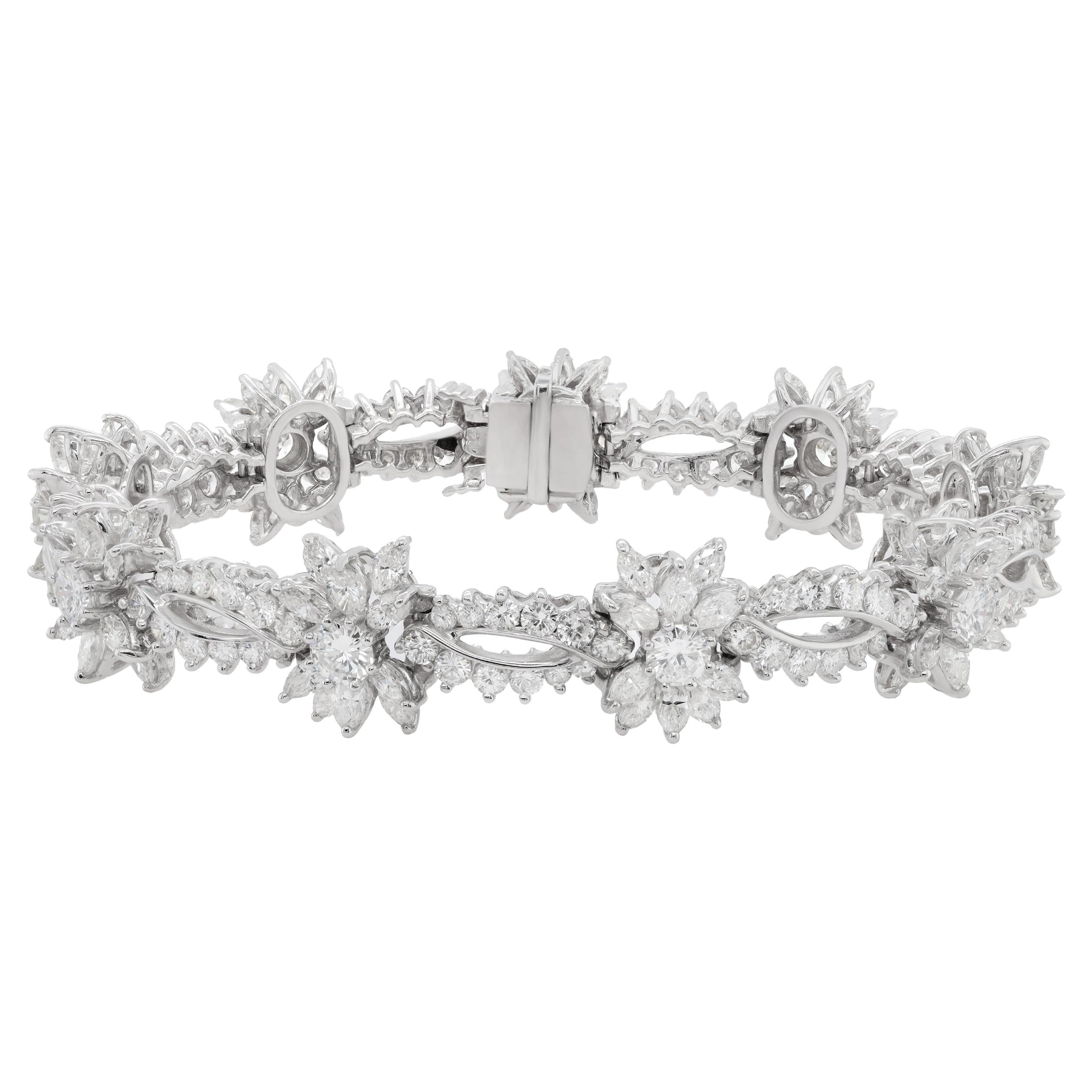 Diana M. Platinum diamond fashion bracelet featuring snow flake cluster design  For Sale