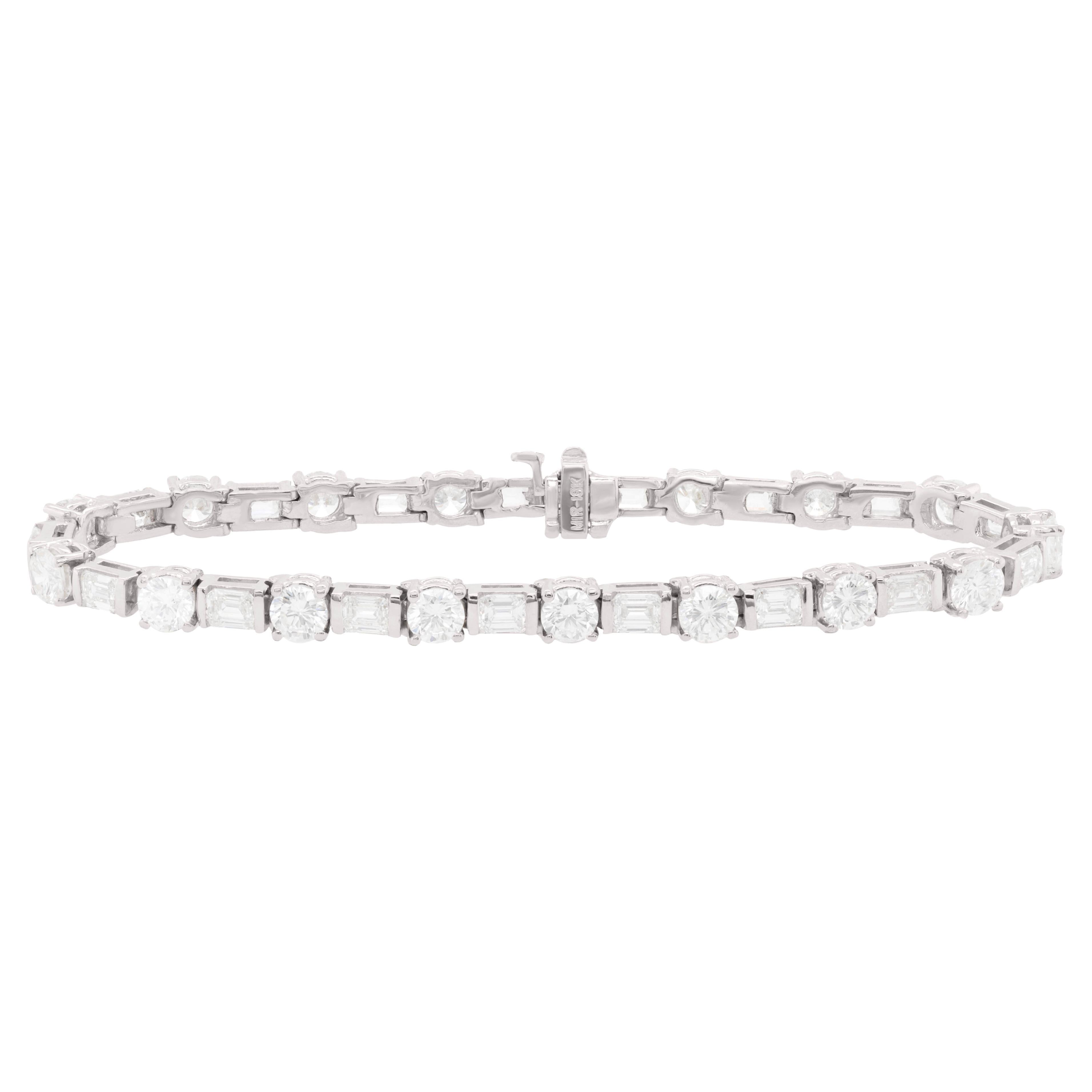 Diana M. Platinum diamond tennis bracelet adorned with 12.70 cts tw  For Sale