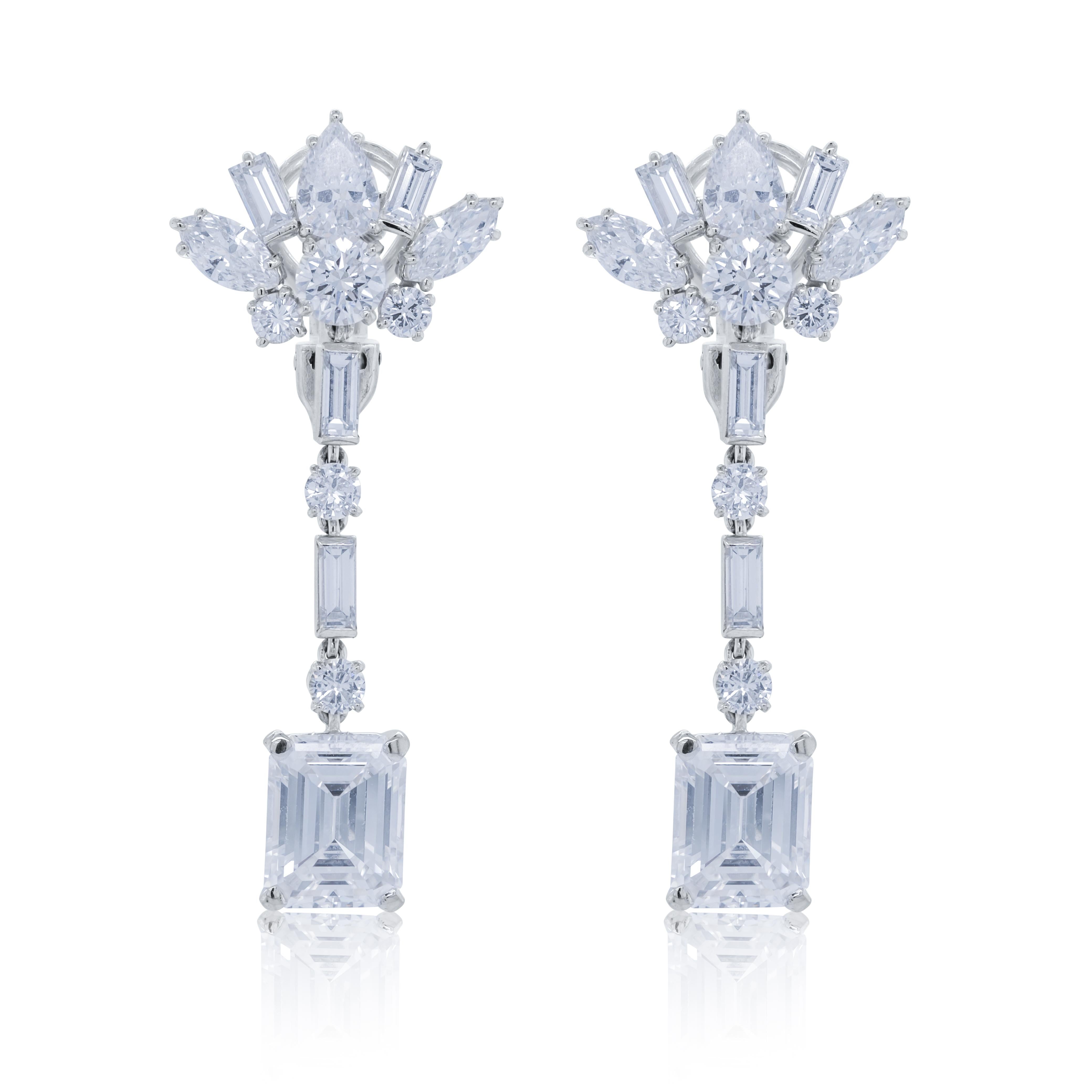 PLATINUM HAGNING EARRINGS  SET WITH GIA DIAMONDS 2.47CT E VVS2 AND 2.63 F IF 
EMERALD CUTS WITH MIXED DIAMONDS PEARS AND  MARQUIES 3.00CTS ADDITIONAL ON THEM 
Diana M is one-stop shop for all your jewelry shopping, carrying line of diamond rings,