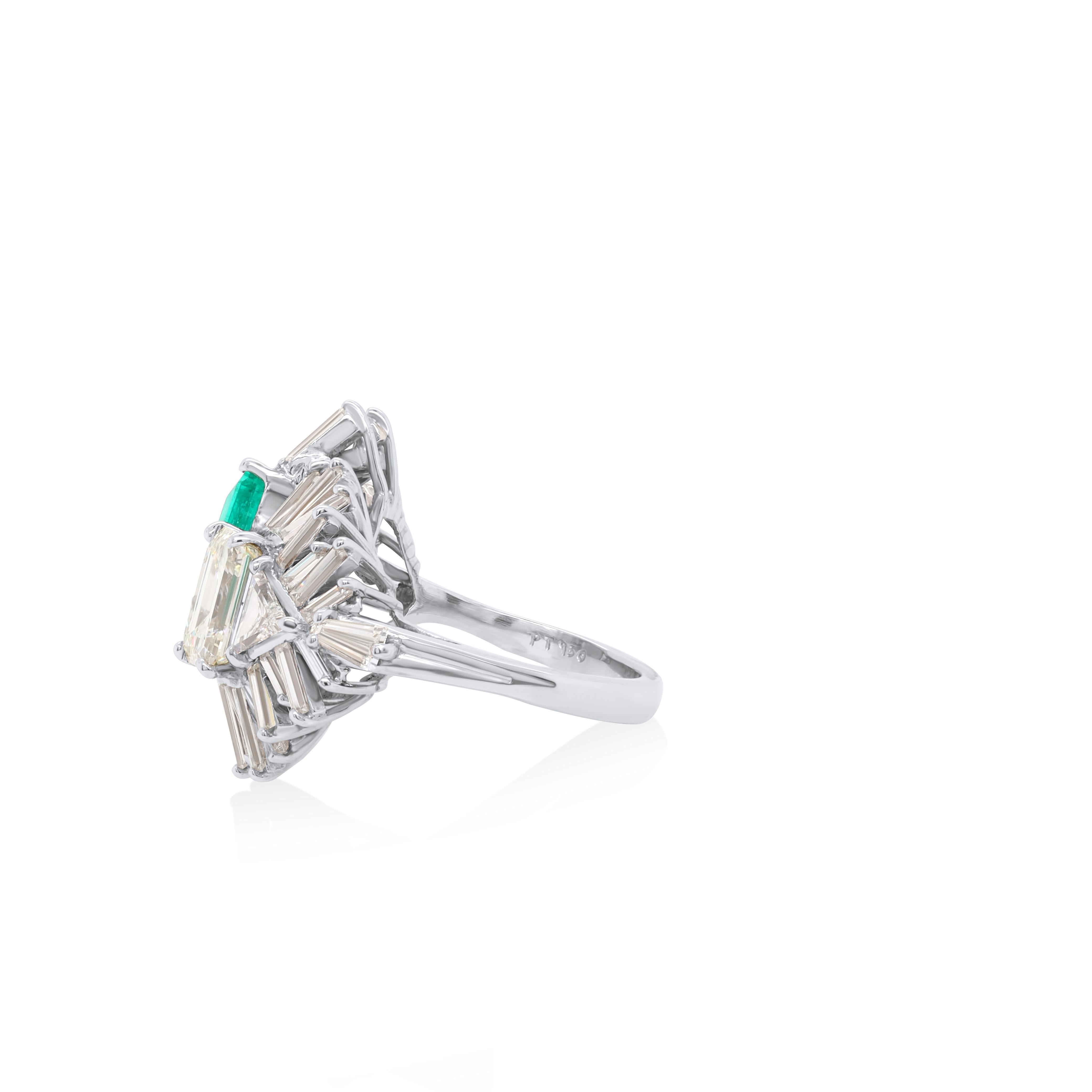 Modern Diana M. Platinum emerald and diamond ring featuring a 2.15 ct emerald  For Sale