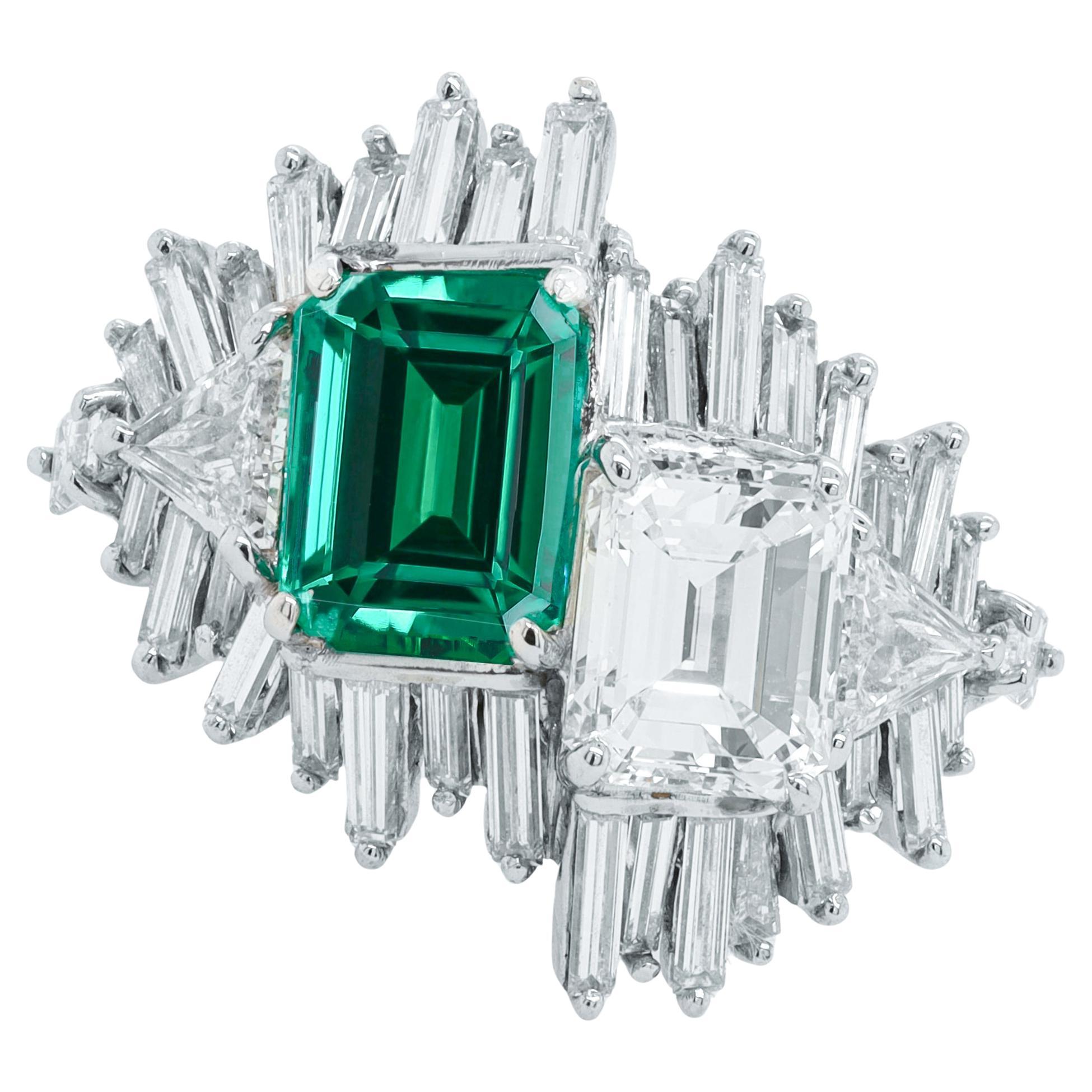 Diana M. Platinum emerald and diamond ring featuring a 2.15 ct emerald  For Sale