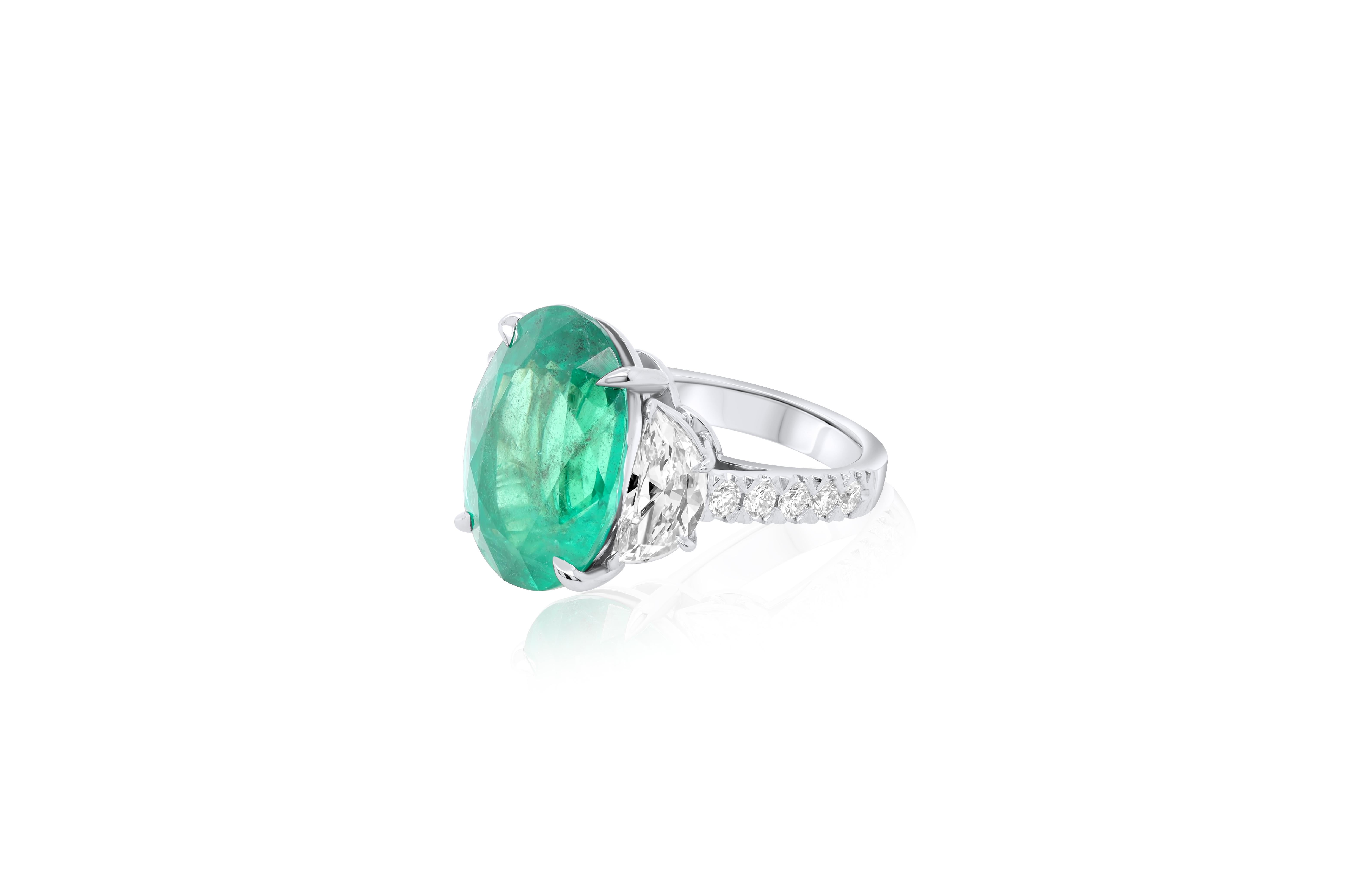 Emerald Cut Diana M. Platinum emerald and diamond ring featuring a center 13.50 ct oval cut  For Sale
