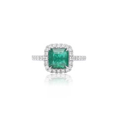 Diana M. Platinum emerald diamond ring featuring a 2.00 ct cushion cut emerald