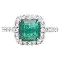 Diana M. Platinum emerald diamond ring featuring a 2.00 ct cushion cut emerald 