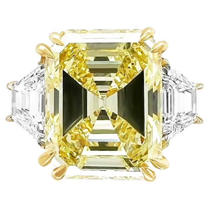 Platinum engagement ring featuring a center 10.82 ct emerald cut diamond(GIA#2223782378) (FIY VS2) with 1.45 cts tw of trapezoids on the sides (H-I,VS)
Diana M is one-stop shop for all your jewelry shopping, carrying line of diamond rings, earrings,
