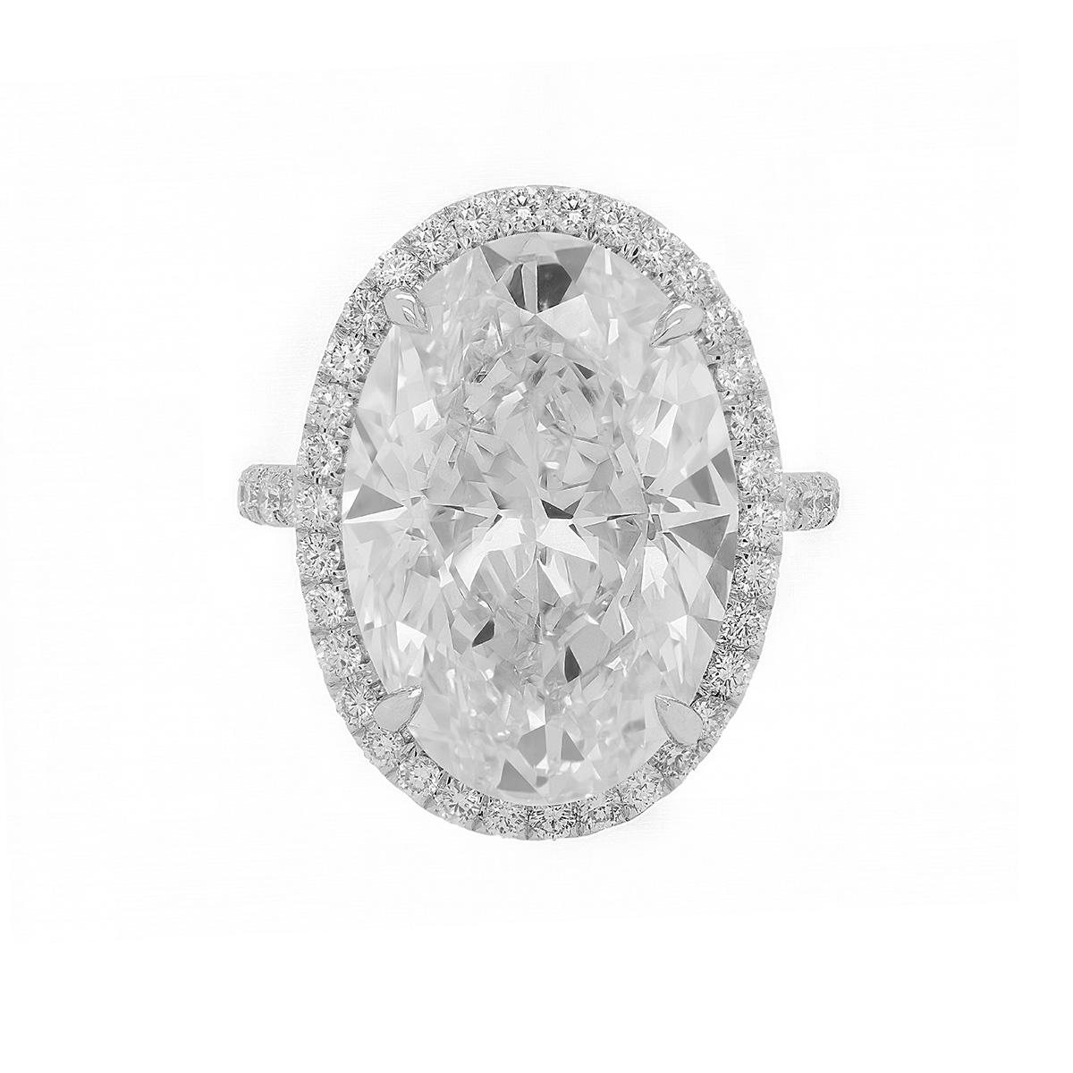 Platinum engagement ring featuring a center 11.77 ct GIA certified (J-VS2) oval cut diamond(OVC254) surrounded by 1.00 cts tw of diamonds in a halo design
Diana M is one-stop shop for all your jewelry shopping, carrying line of diamond rings,