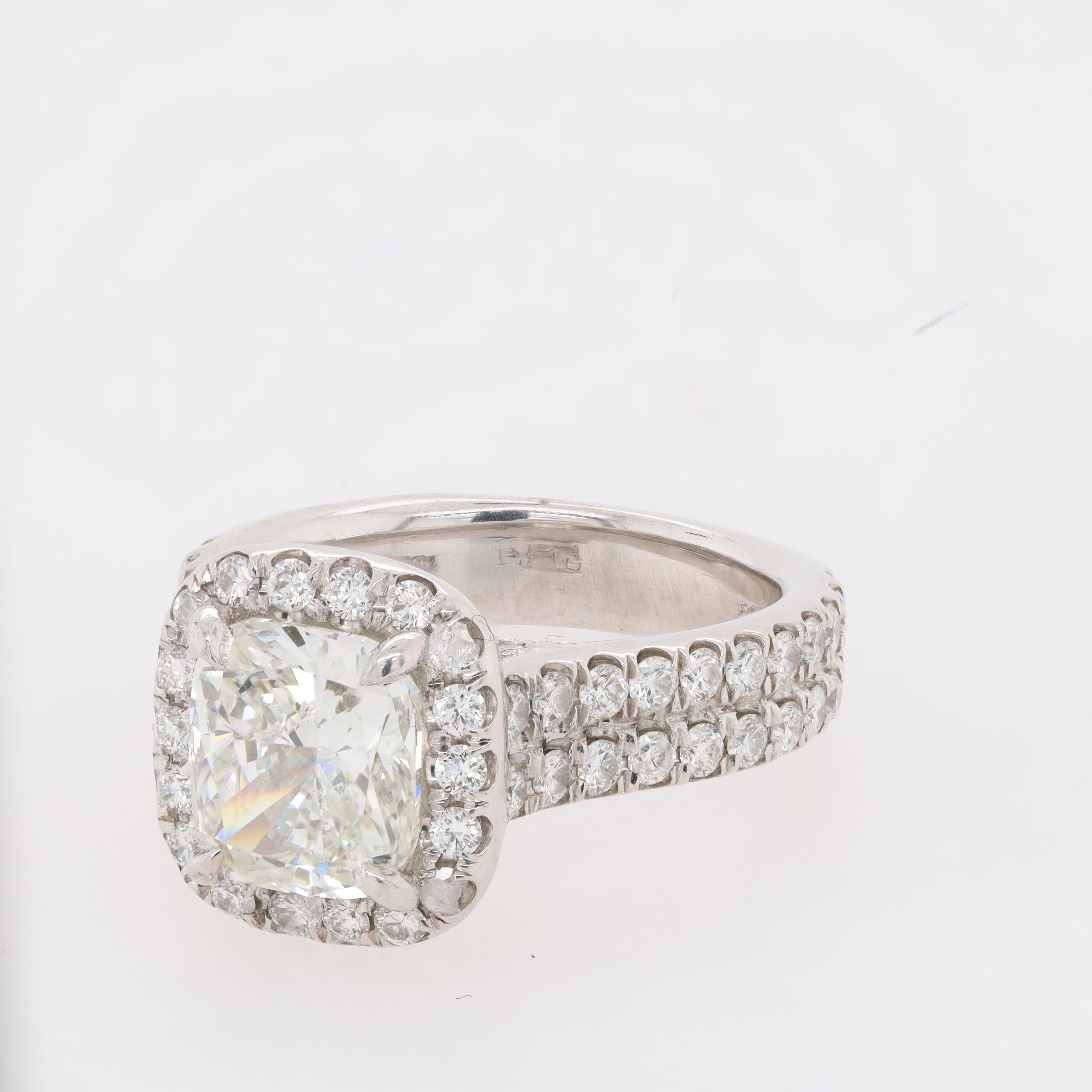 Modern Diana M. Platinum engagement ring featuring a center 2.01 ct GIA certified  For Sale