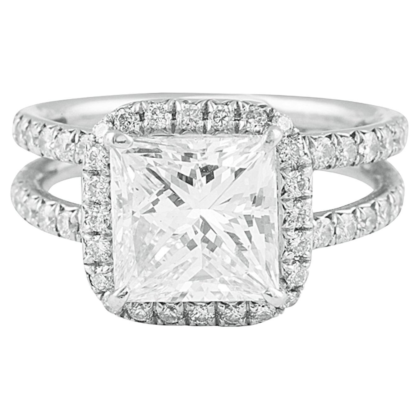 DIANA M. Platinum engagement ring featuring a center 3.00 ct GIA G VS2 PRINCESS For Sale