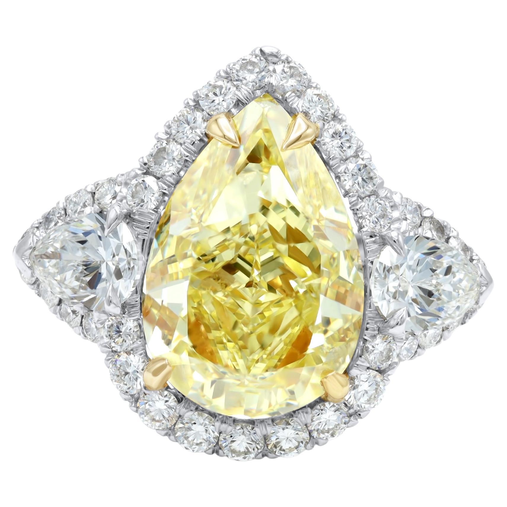 DIANA M. Platinum engagement ring featuring a center 4.18 ct GIA  (FY VS2) PEAR For Sale