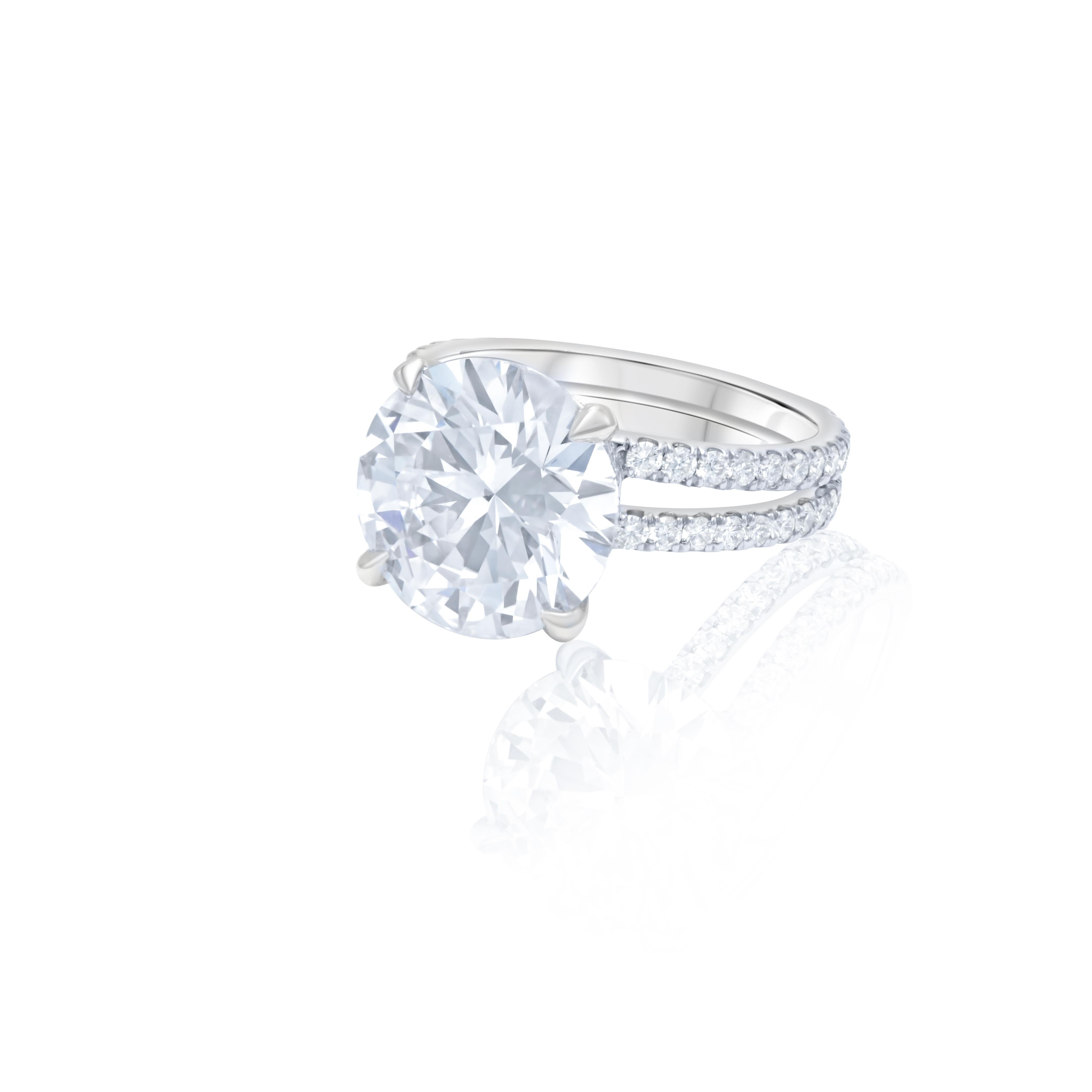 Platinum engagement ring featuring a center 6.30 ct round diamond(gia#2221118307) (G-VS2) with 1.50 cts tw of diamonds on the band
Diana M. is a leading supplier of top-quality fine jewelry for over 35 years.
Diana M is one-stop shop for all your