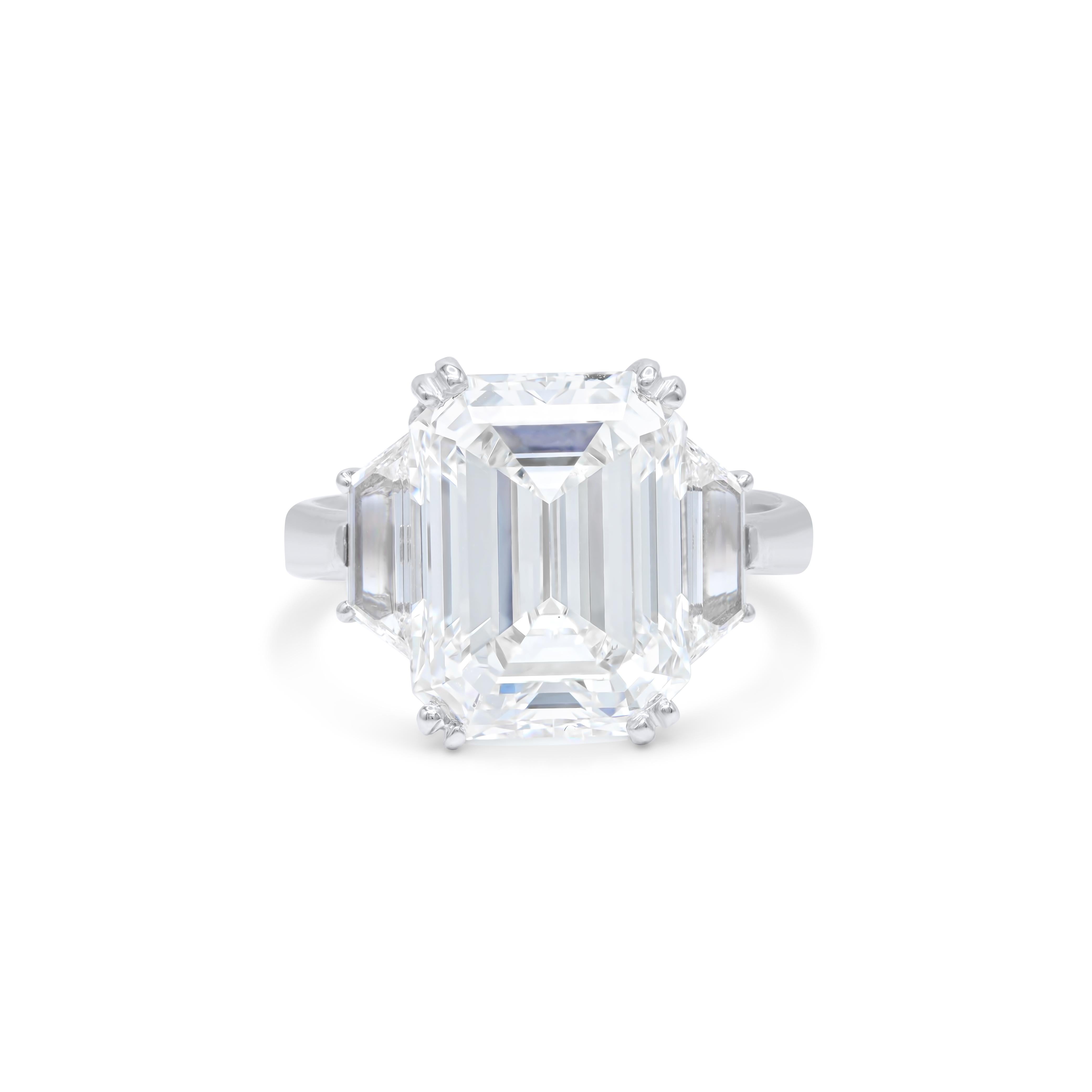 Modern DIANA M. Platinum engagement ring featuring a center 8.08 ct emerald cut diamond For Sale
