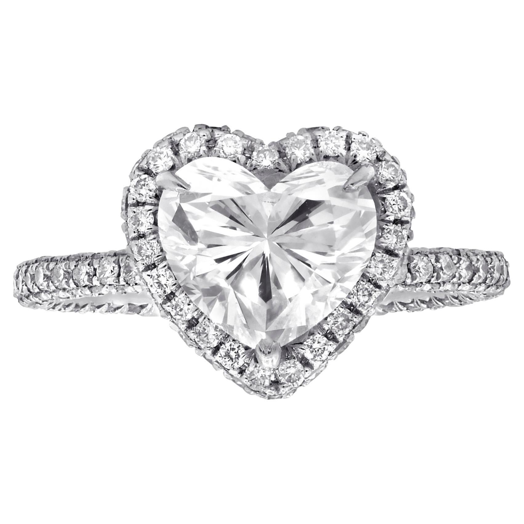 DIANA M. Platinum engagement ring featuring a center (G-SI2) 2.01 ct heart  For Sale
