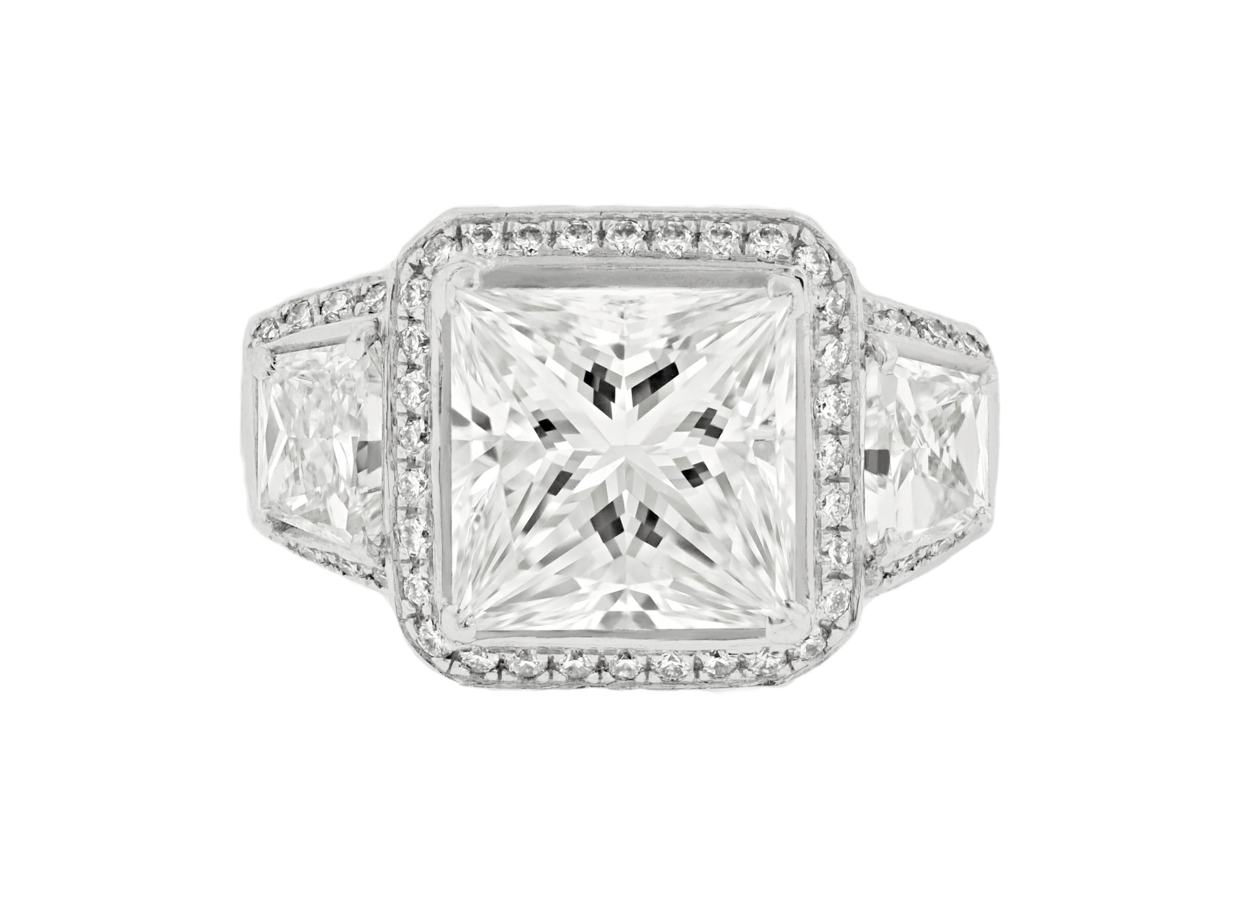 DIANA M. Platinum engagement ring featuring a center (I-VVS1) 3.45 ct princess  In New Condition For Sale In New York, NY
