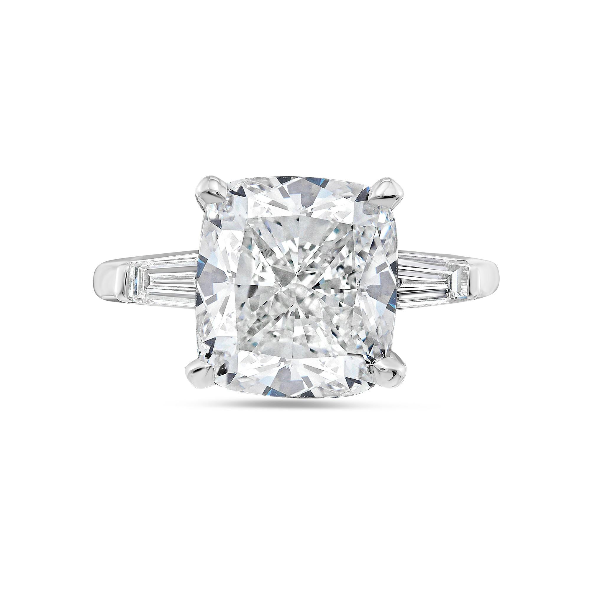 Platinum engagement ring featuring a center (J-SI1) 5.01 ct cushion cut GIA certified diamond with 0.30 cts tw of baguette diamonds on the band