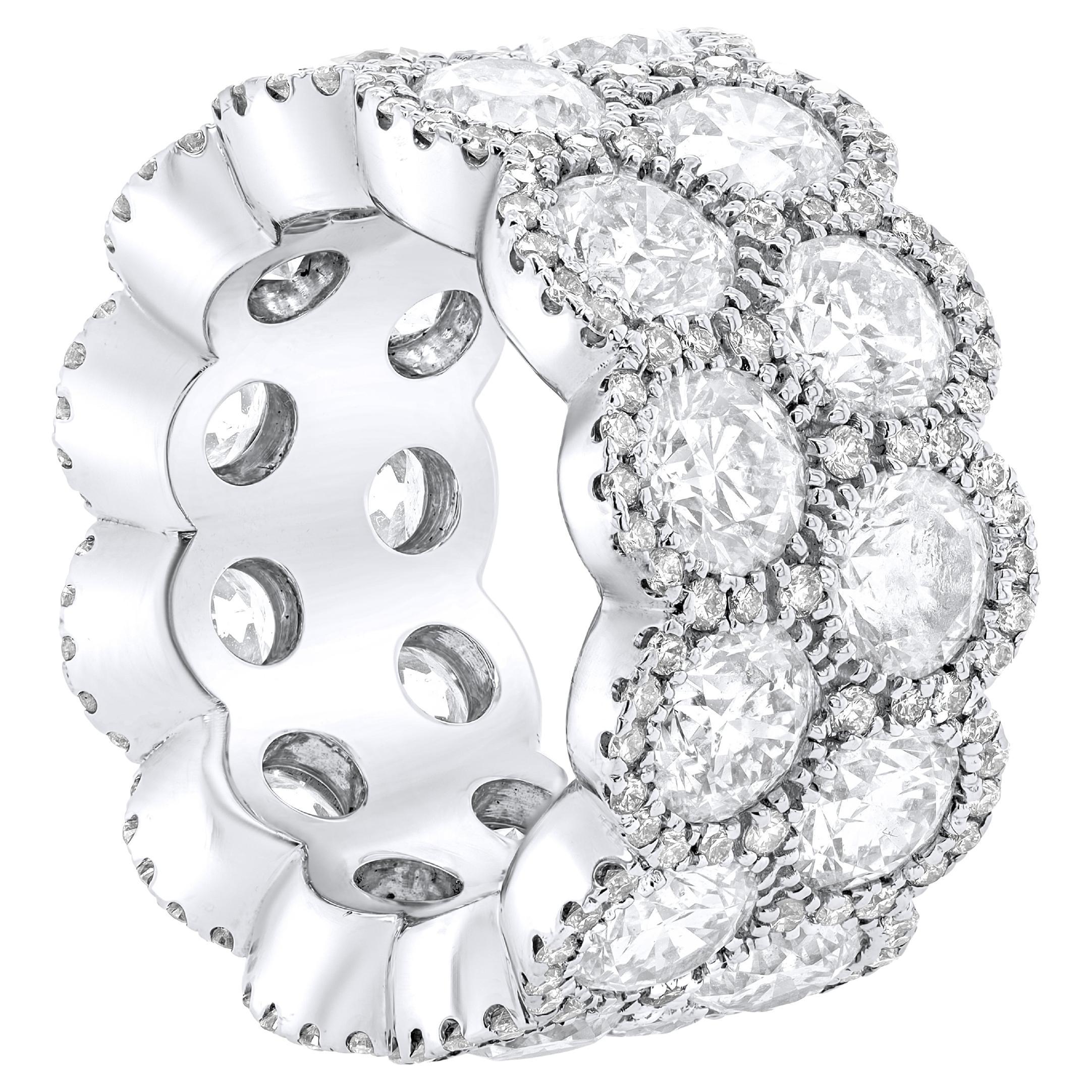 Diana M. platinum eternity band with halo setting features 12.06 ct of 24 round For Sale