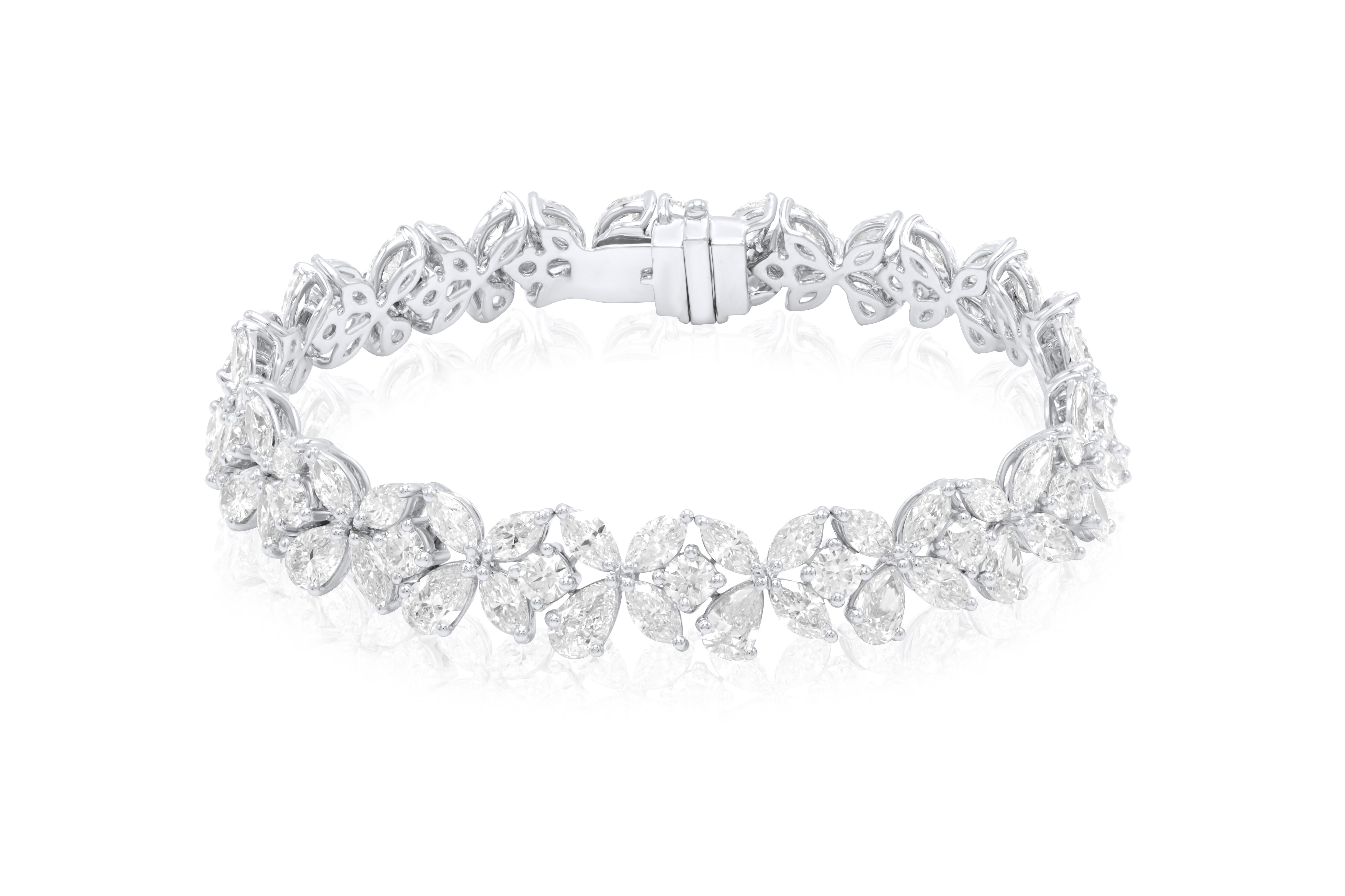 Platinum fancy multi-shaped diamond cluster bracelet featuring 20.55 cts of diamonds, 90 stones