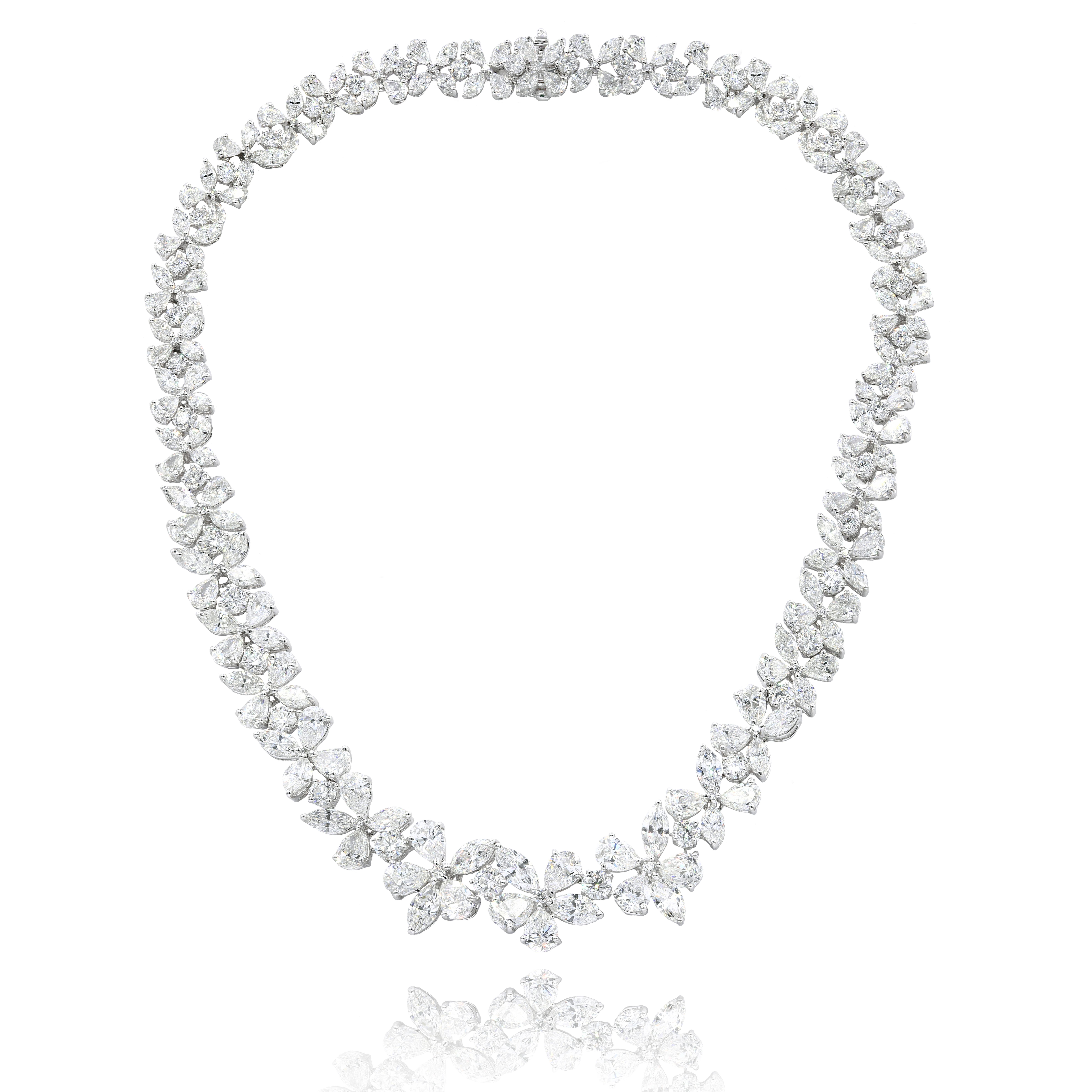 Platinum flower necklace featuring 52.15 cts of diamonds with round and pear shapes
Diana M. is a leading supplier of top-quality fine jewelry for over 35 years.
Diana M is one-stop shop for all your jewelry shopping, carrying line of diamond rings,