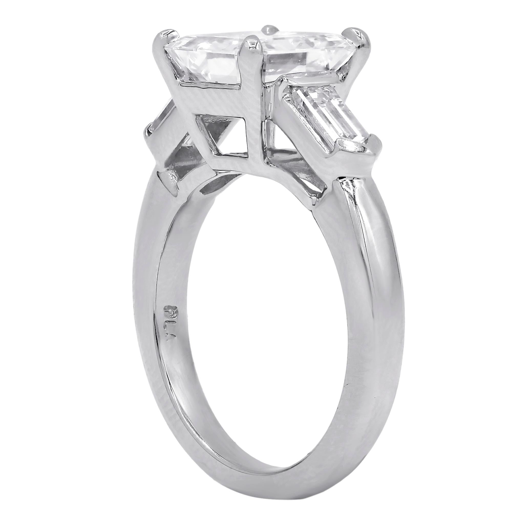 Platinum engagement ring featuring a center 2.86 ct GIA certified (G-VS2) square emerald cut diamond(EMC489) with 0.70 cts tw of 2 bullet shaped diamonds on the sides