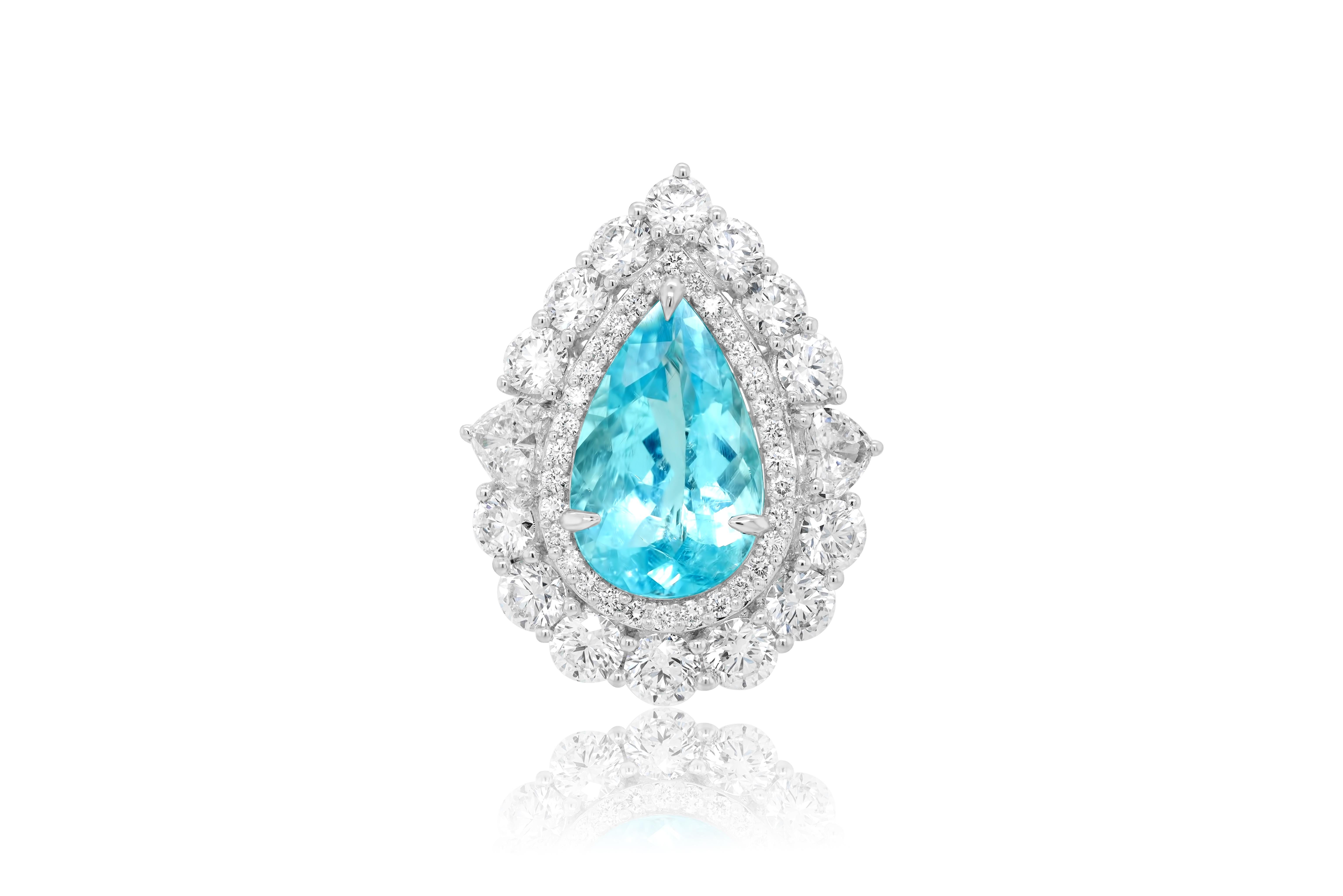 Platinum Paraiba pendant and diamond ring (two-in-one) featuring a 9.66 ct pear shaped paraiba surrounded 2 heart shape stones weighing 0.91 cts and 5.70 cts of round diamonds.
Diana M. is a leading supplier of top-quality fine jewelry for over 35