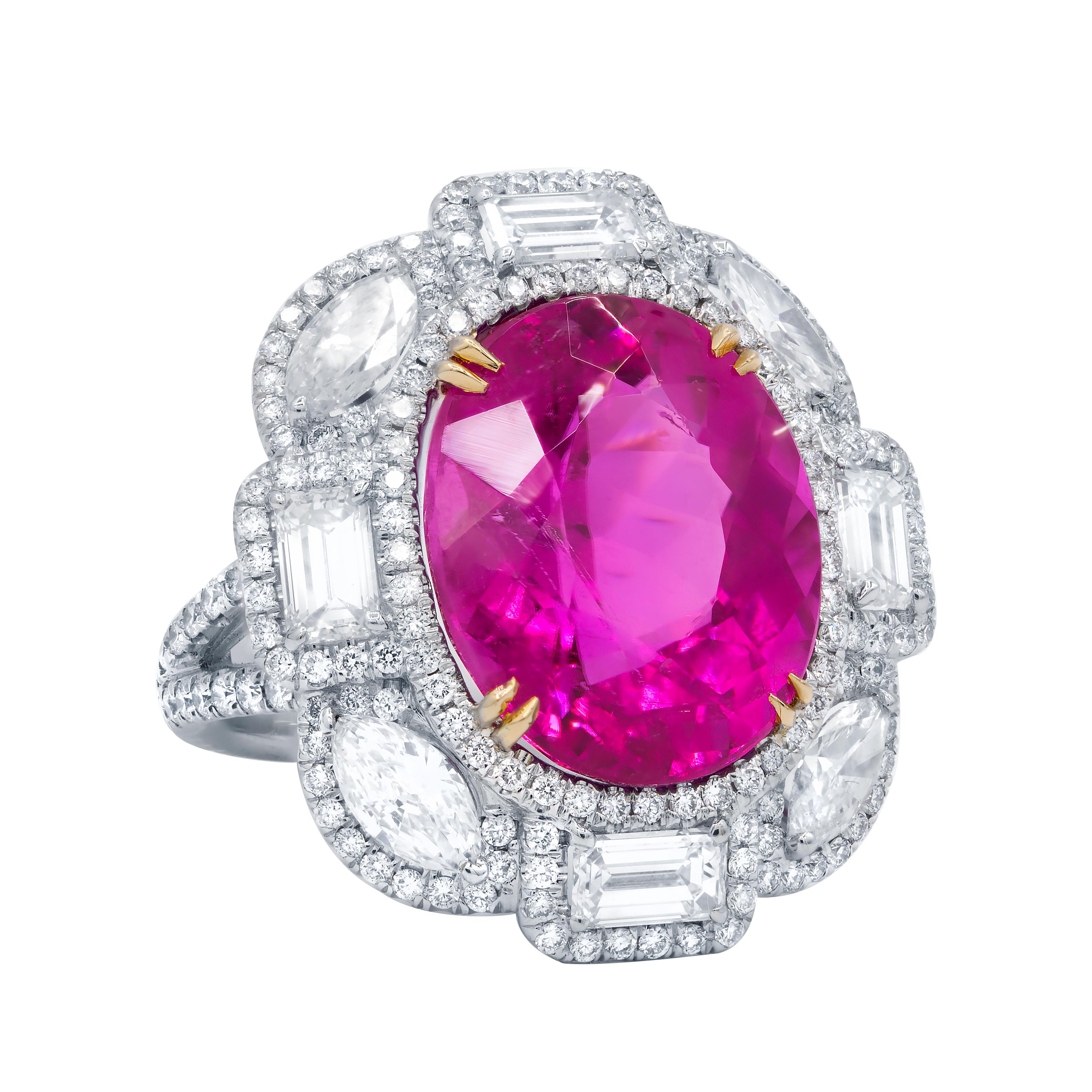 Platinum tourmaline and diamond ring featuring a center 11.80 ct pink tourmaline surrounded by emerald cut, marquise cut, and round diamonds with 2 rows of diamonds totaling 3.80 cts tw.
Diana M. is a leading supplier of top-quality fine jewelry for