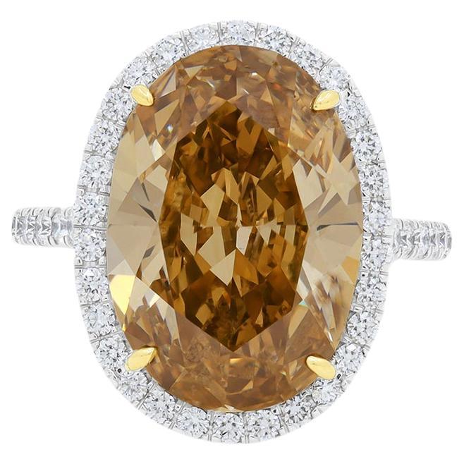 Diana M. Platinum Ring Featuring a center 7.91ct GIA certified Fancy Conac Brown For Sale