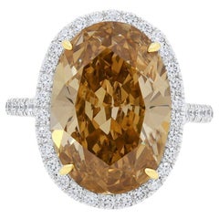 Diana M. Platinum Ring Featuring a center 7.91ct GIA certified Fancy Conac Brown