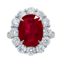 Diana M. Platinum ruby and diamond ring featuring a 6.06 ct C.Dunaigre certified