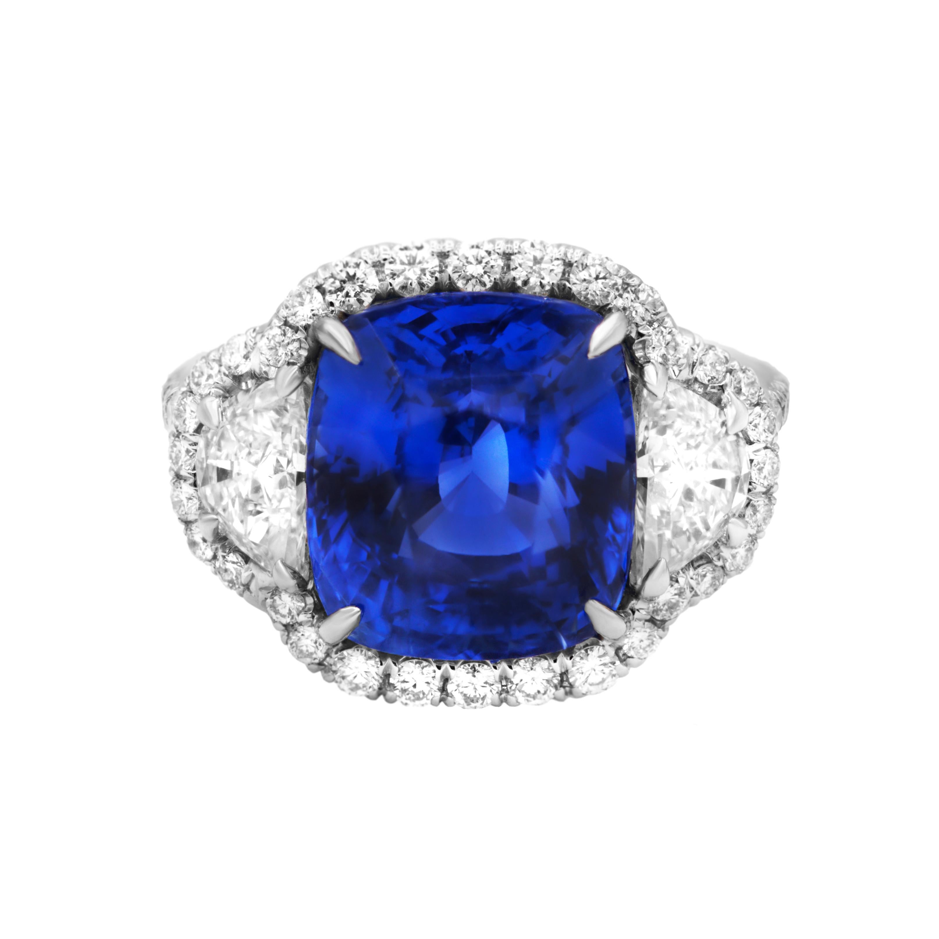 Platinum sapphire and diamond ring featuring a 9.11 ct GRS certified unheated cushion cut ceylon sapphire with 2 half moon shaped diamonds and halo totaling 1.40 cts tw.
Diana M. is a leading supplier of top-quality fine jewelry for over 35