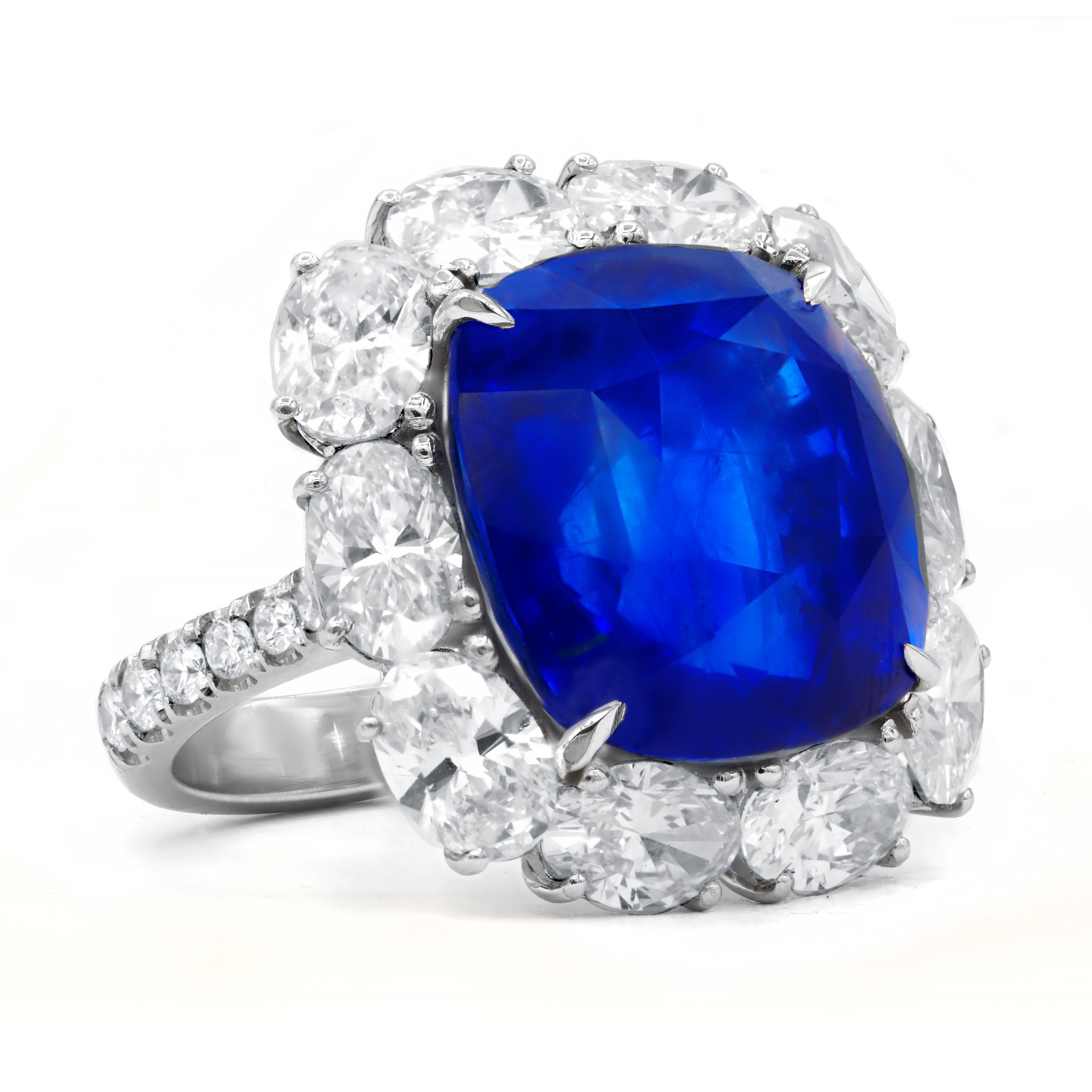 Platinum sapphire and diamond ring featuring a GRS certified 24.38 ct natural cushion cut blue sapphire with 5.70 cts tw of diamonds surrounding the center gem and going 3/4 around the band
Diana M. is a leading supplier of top-quality fine jewelry