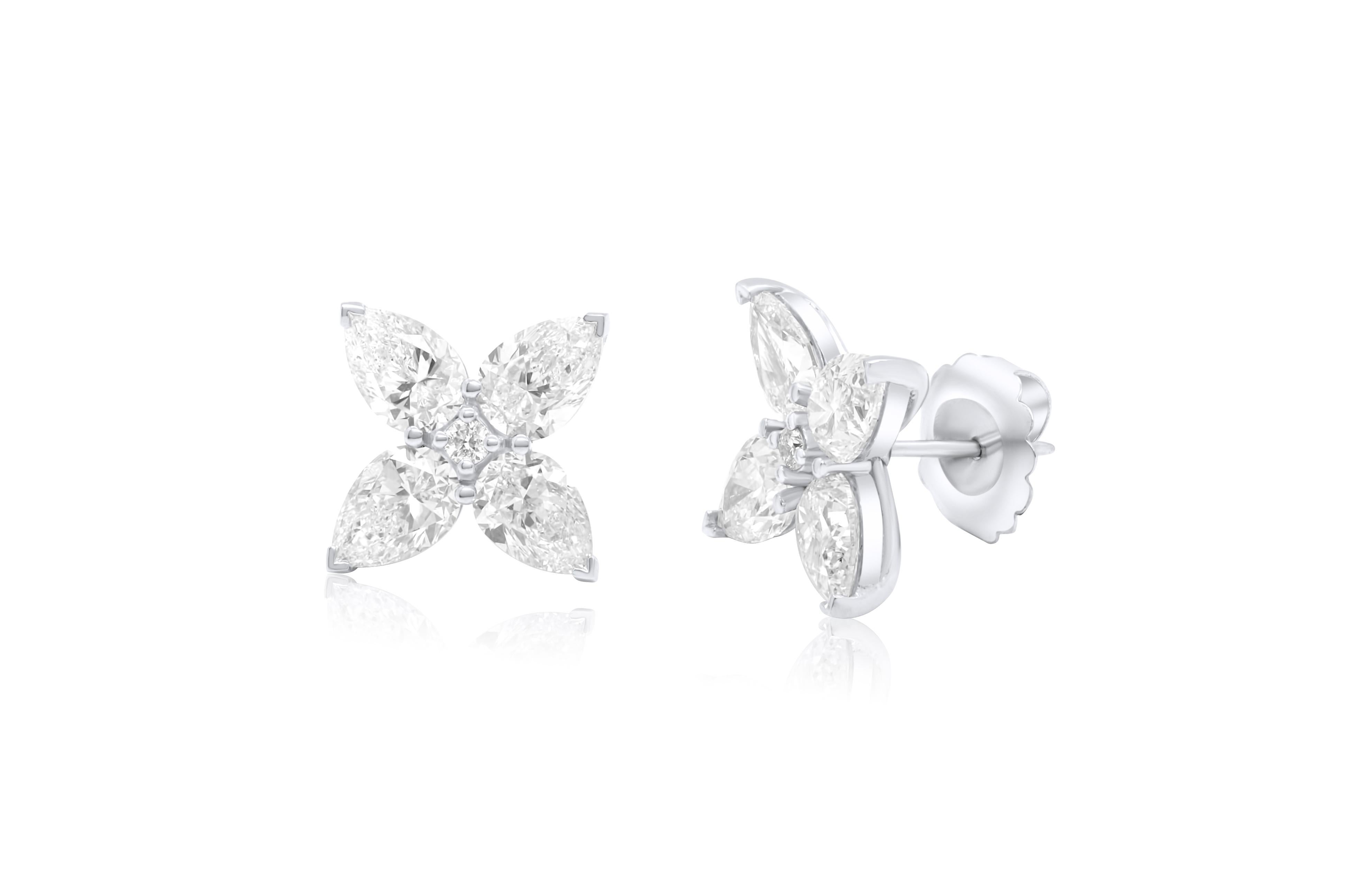 Modern Diana M. Platinum stud clover earrings adorned with 7.11 cts GIA Certified  For Sale