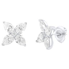 Diana M. Platinum stud clover earrings adorned with 7.11 cts GIA Certified 