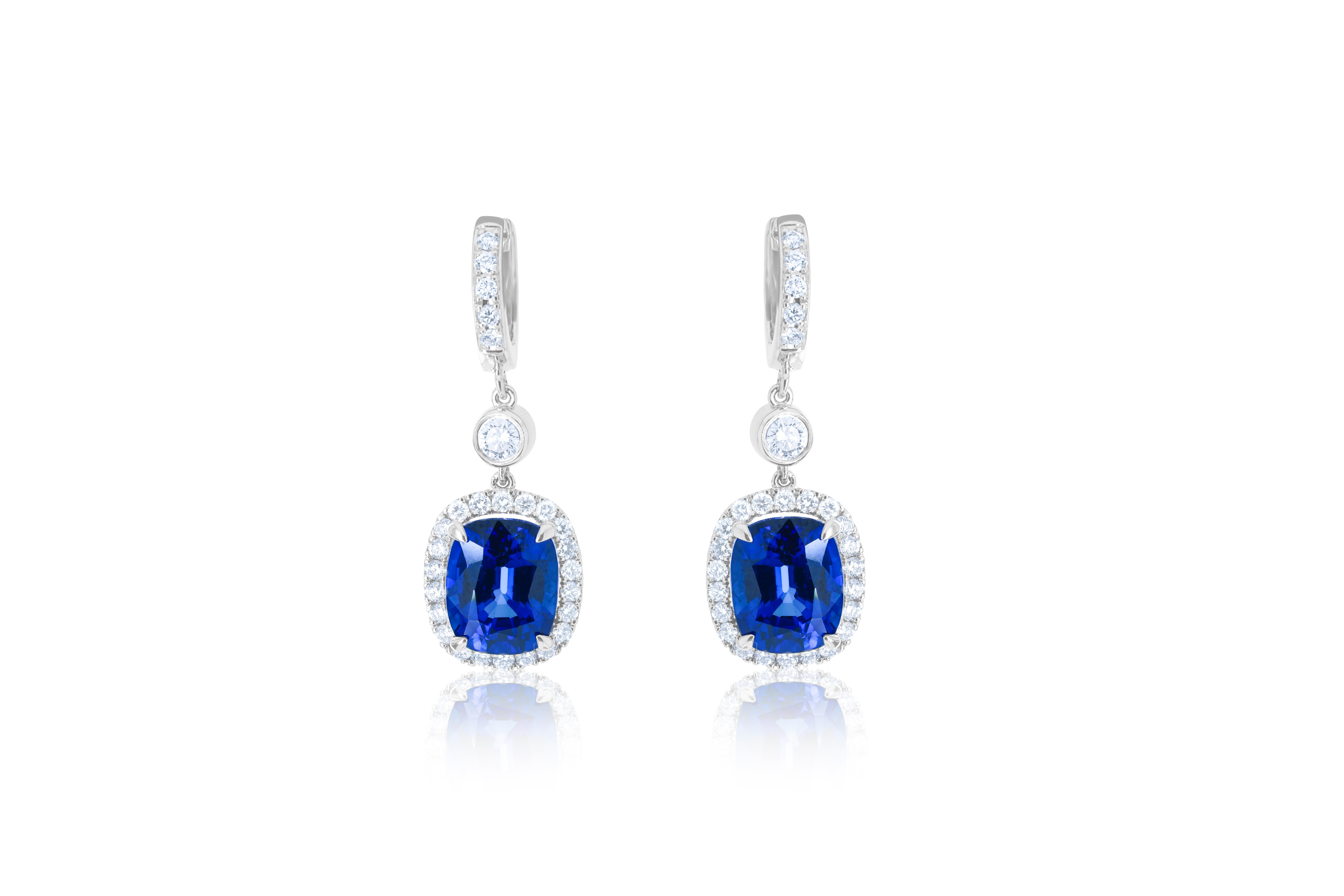 14KT Sapphire Drop Earrings, featuring a magnificent 8.46 carat cushion-cut sapphire corn flower blue color and 1.10cts of halo diamonds .