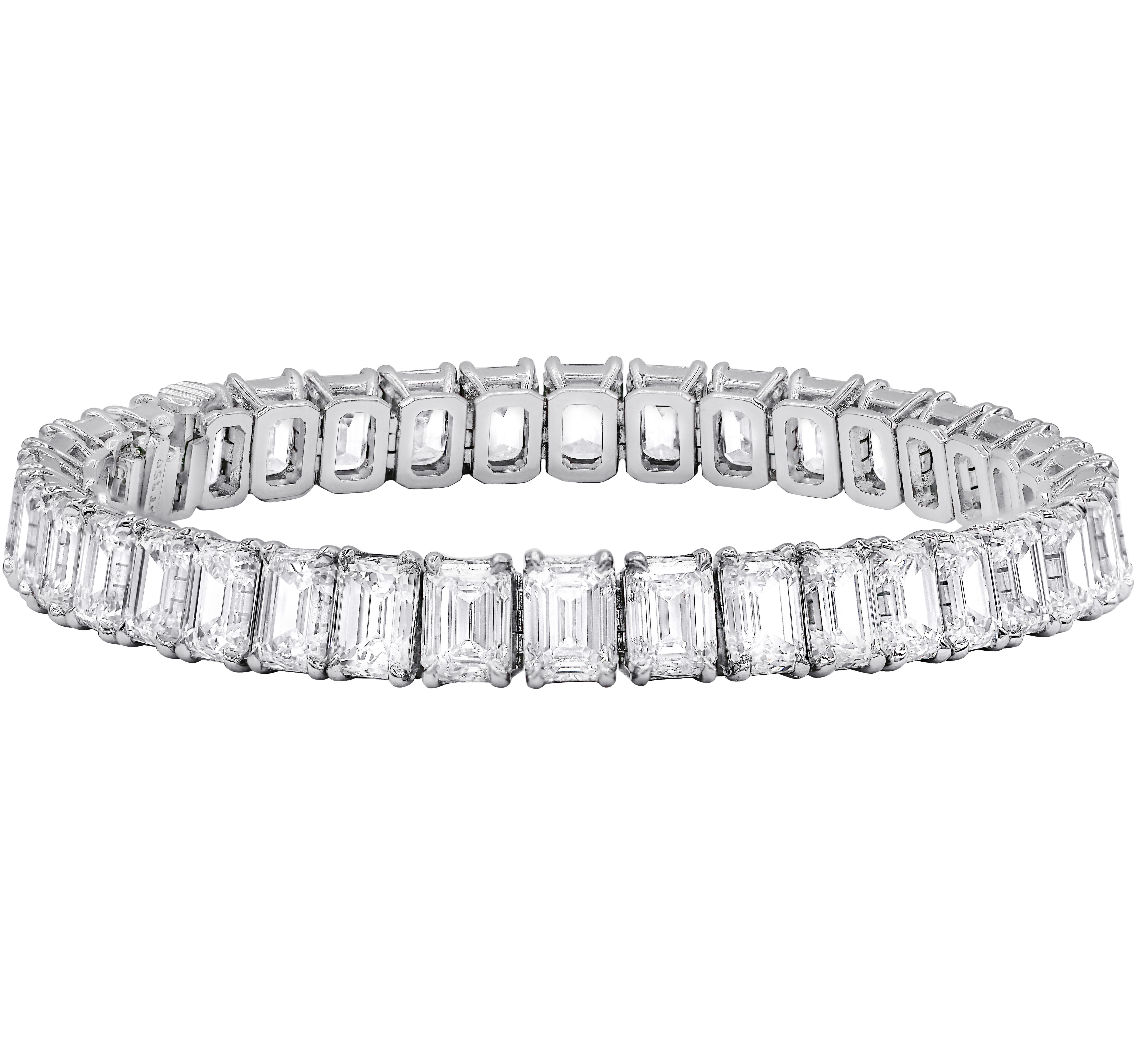 18 kt white gold custom 4 prong diamond bracelet  22.88 cts  GIA certified emerald cut diamonds—color DEF clarity VVS-VS, 44 stones 0.52 each. Excellent Cut.


