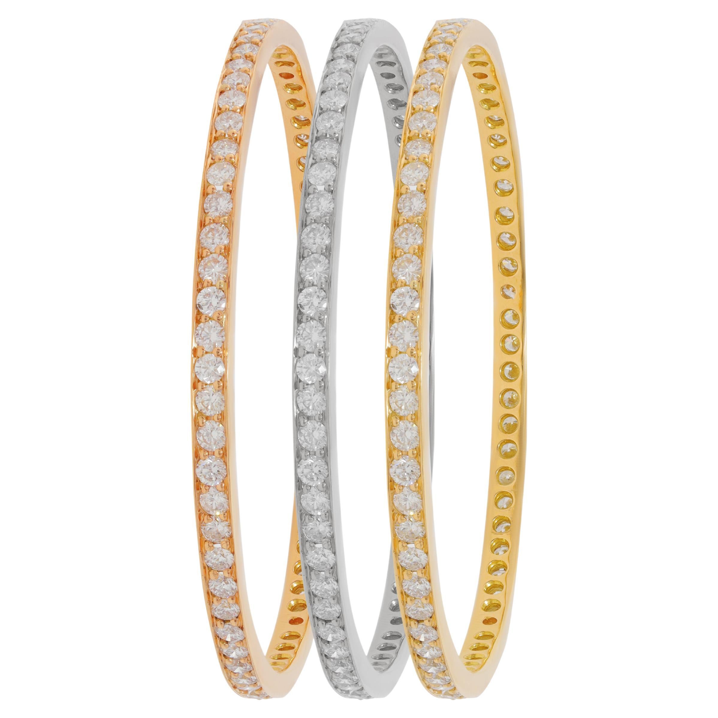 Diana M. Tri-color set of white, yellow, and rose gold bangles adorned with 23ct For Sale