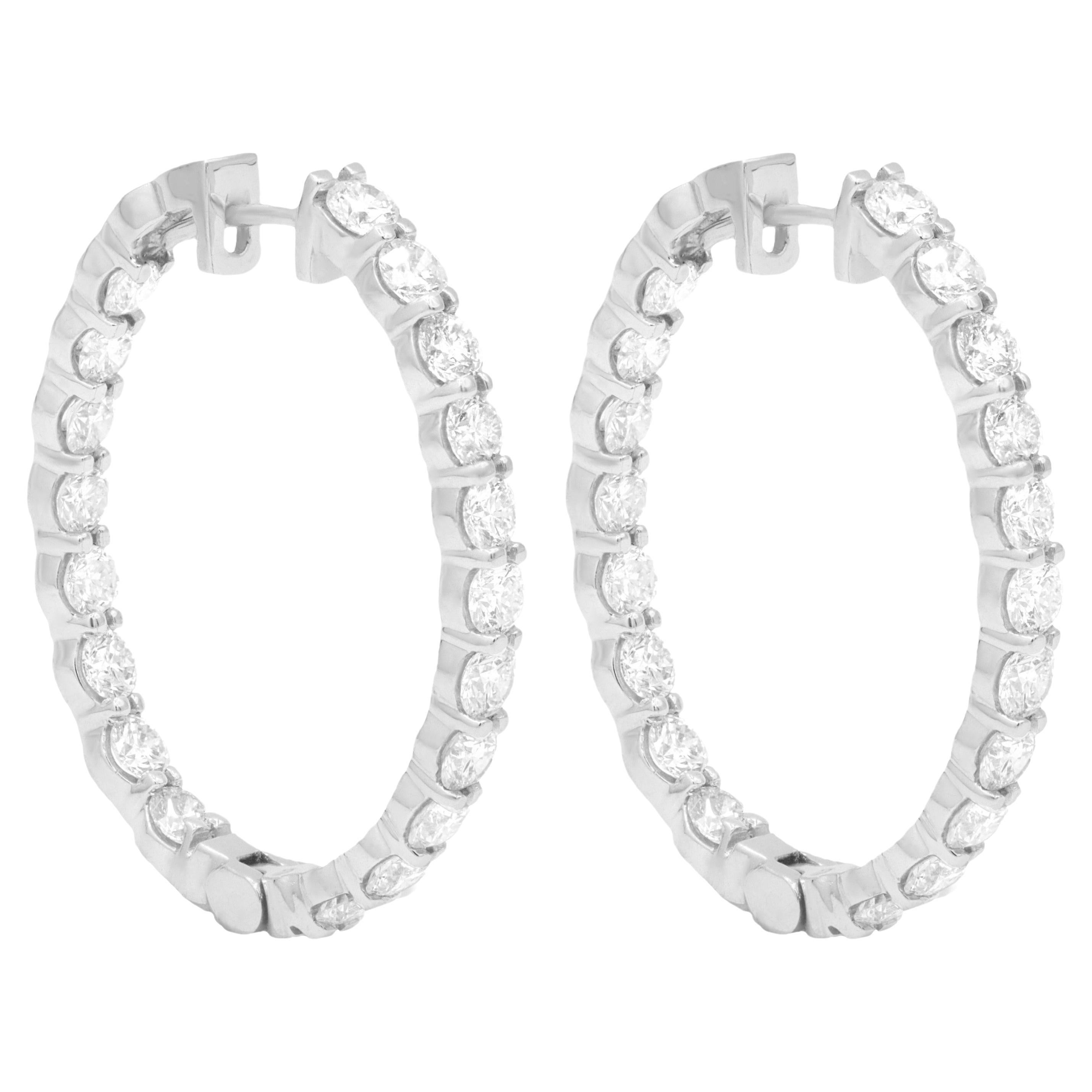 Diana M.14 kt white gold, 1.50" inside-out hoop earrings adorned with 8.12 cts  For Sale