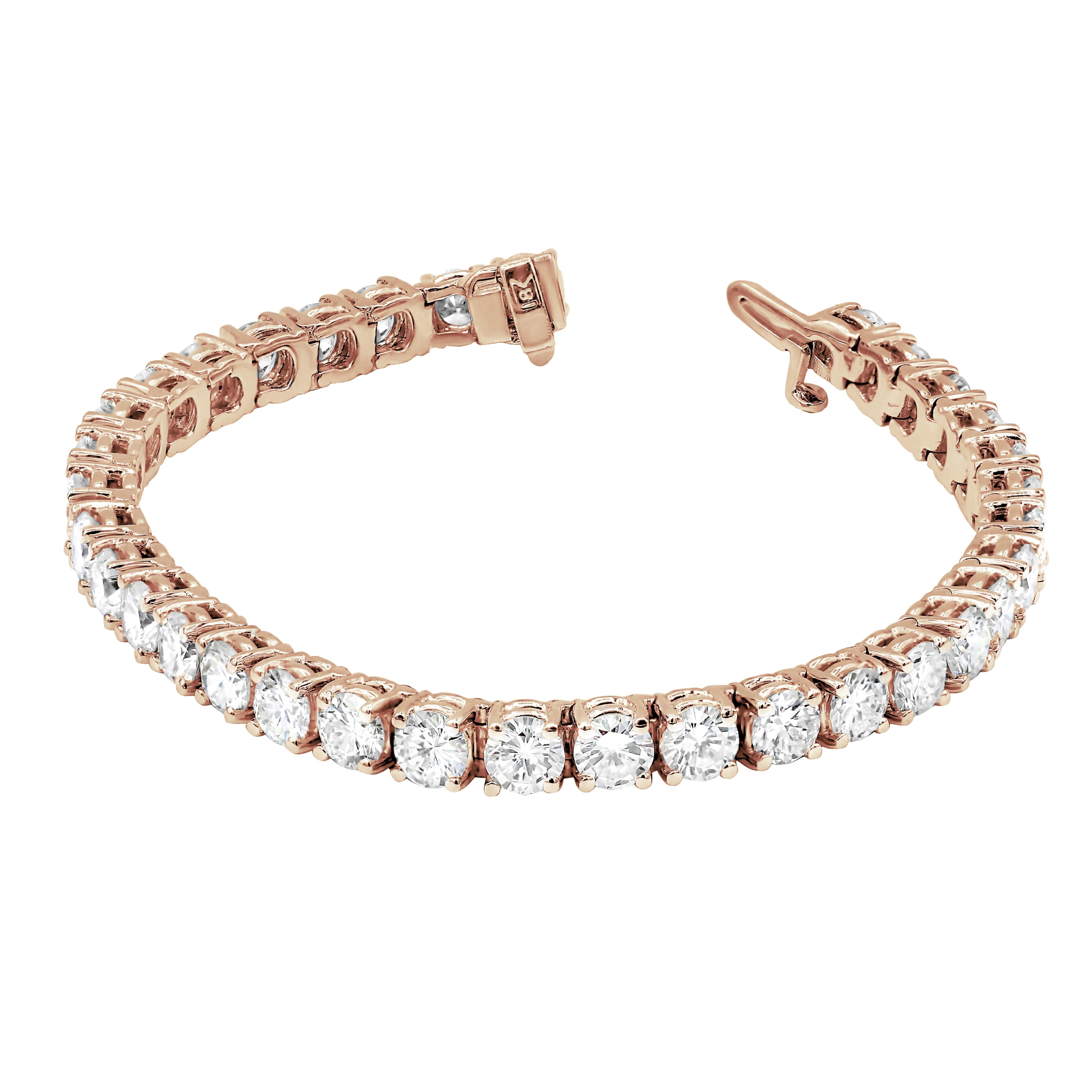 Custom 14kt rose gold tennis bracelet with 4.59 cts round diamonds set in a 4 prong setting 55 stones 0.08 each GH color SI clarity.  Excellent Cut.

