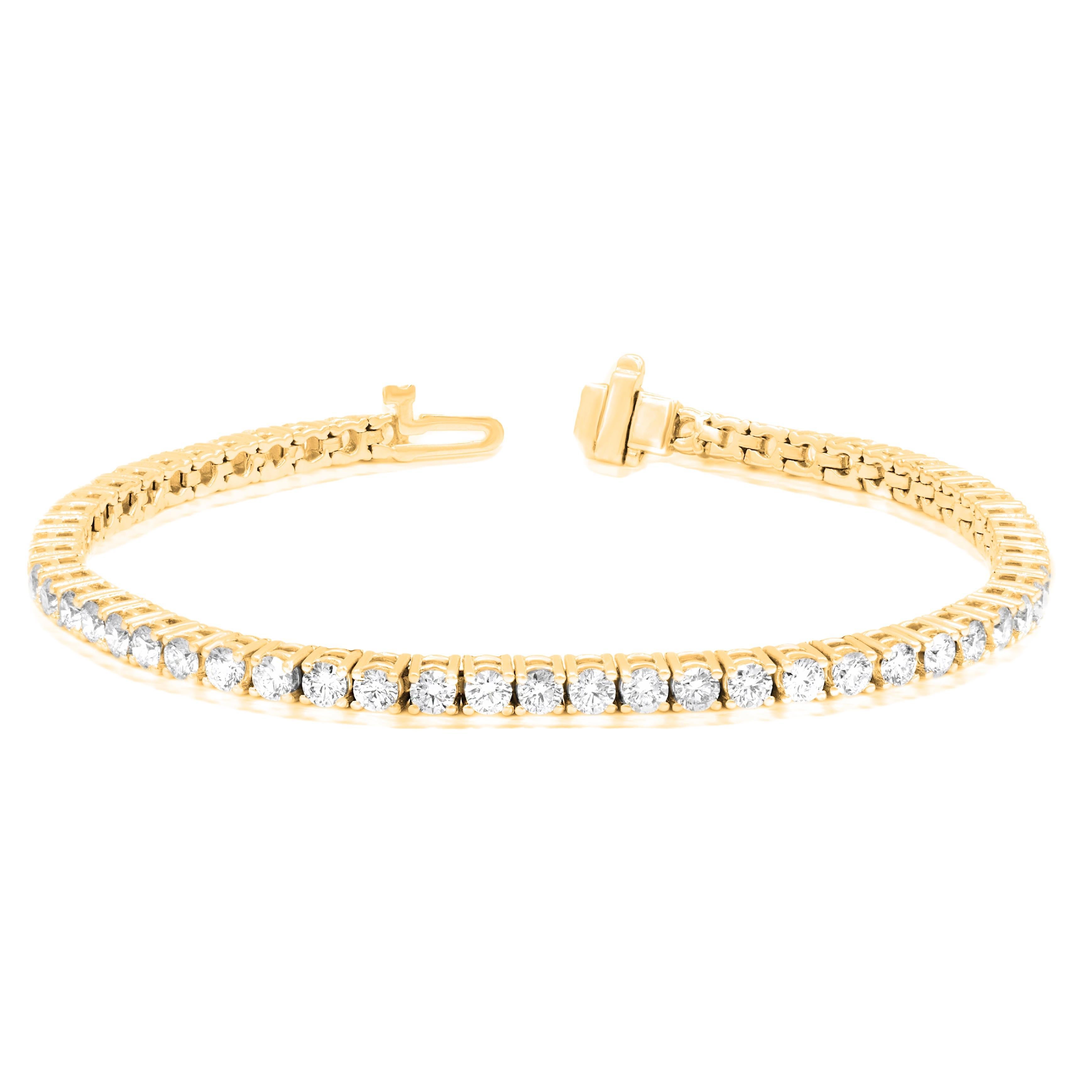 Diana M.14kt yellow gold tennis bracelet featuring 4.00 cts tw of round diamonds For Sale